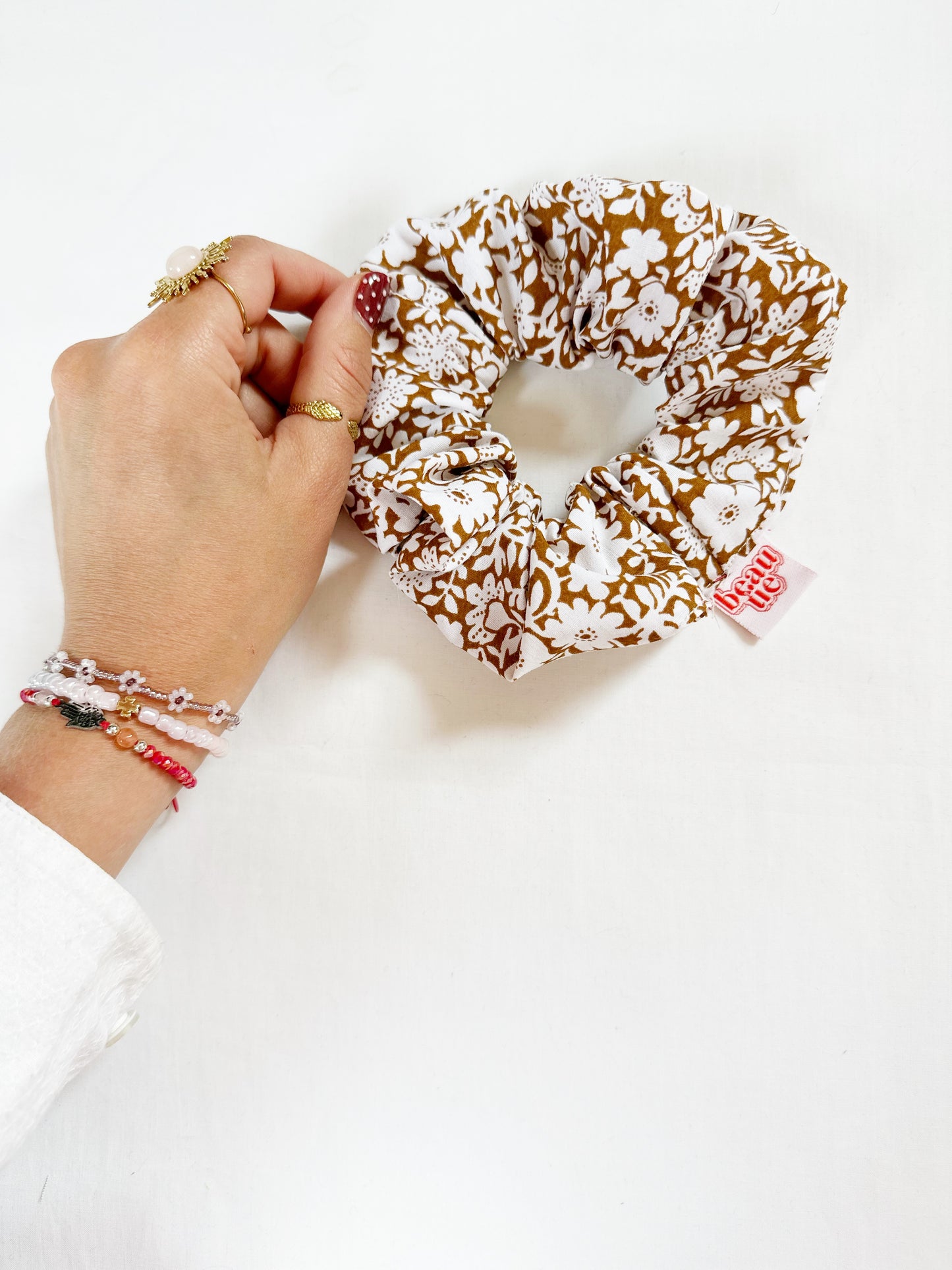 OG scrunchie in brown and white floral