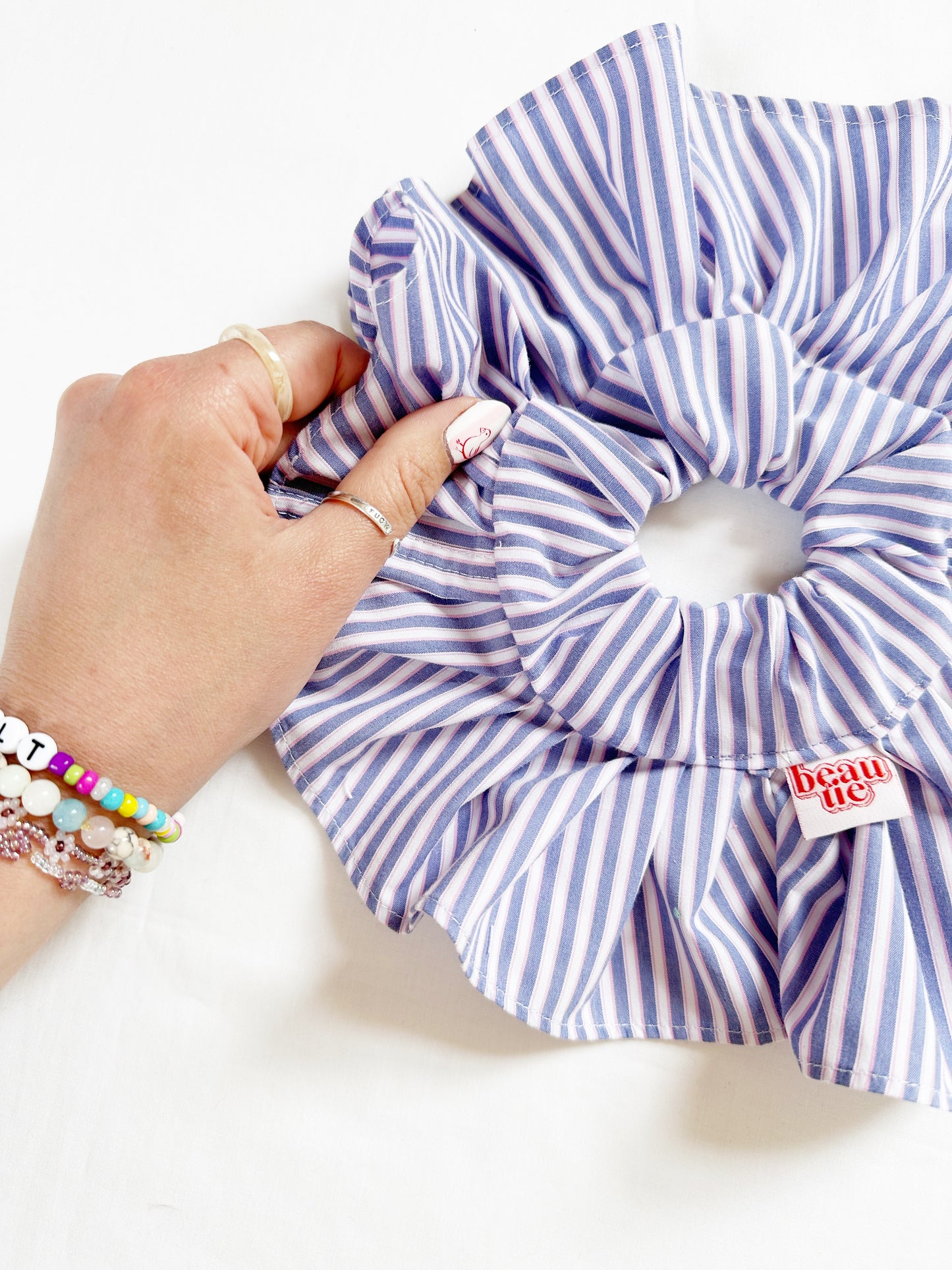 Mini ruffle scrunchie in blue and white stripe cotton