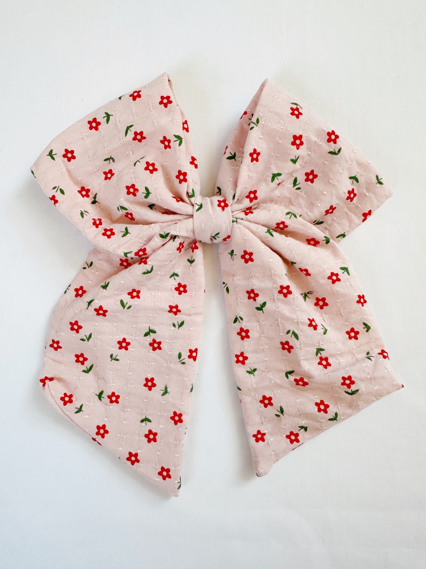 Beau hair bow in pink and red floral
