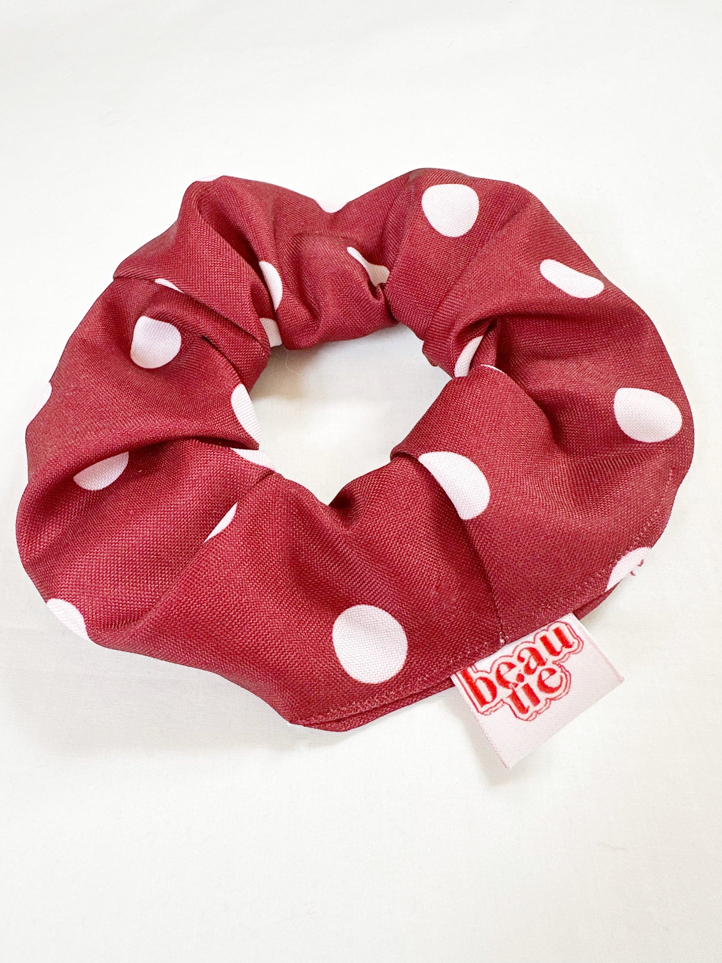 OG scrunchie in burgundy polka dot