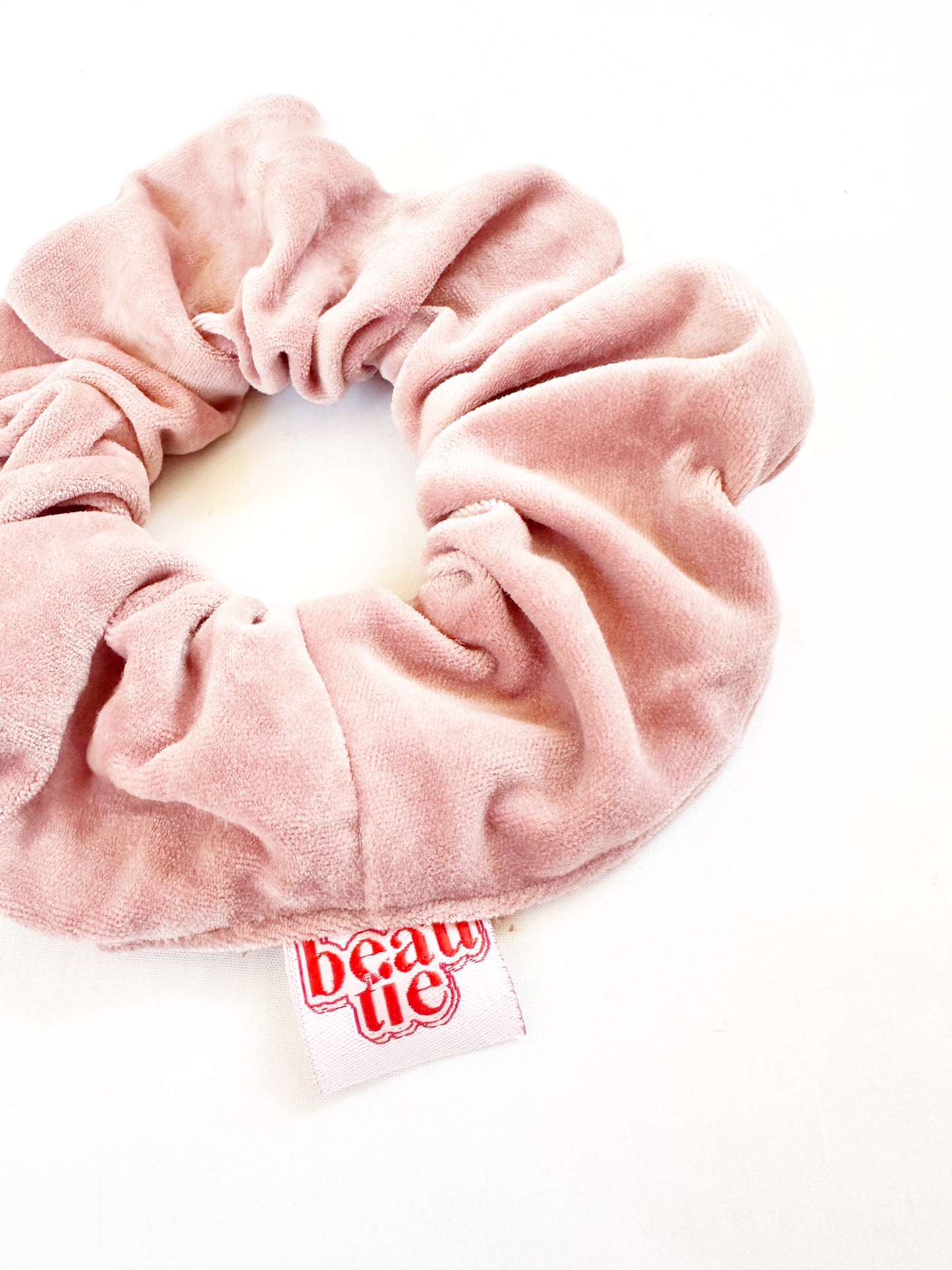 OG scrunchie in pale pink velvet