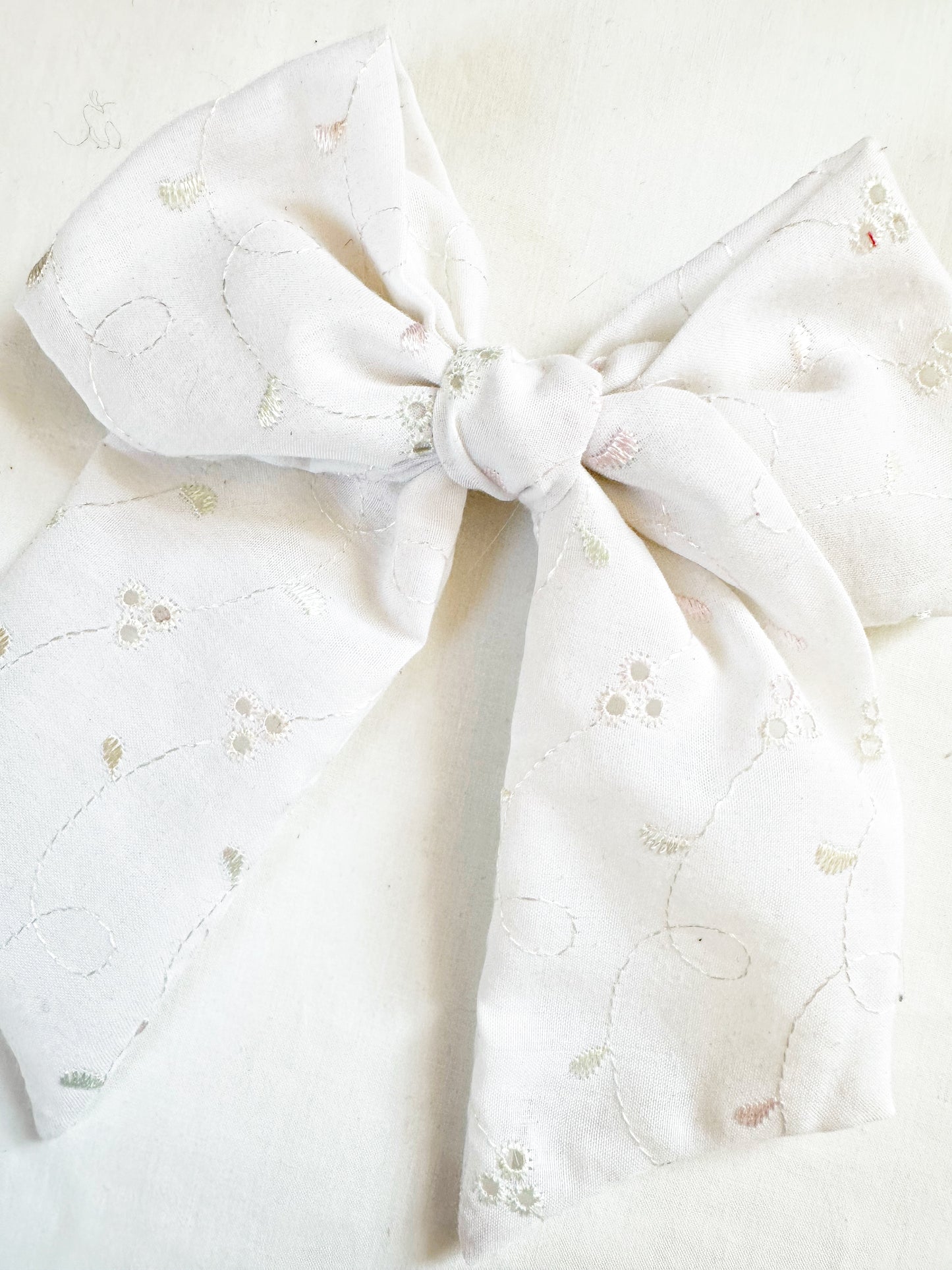 Beau hair bow in Broderie white cotton
