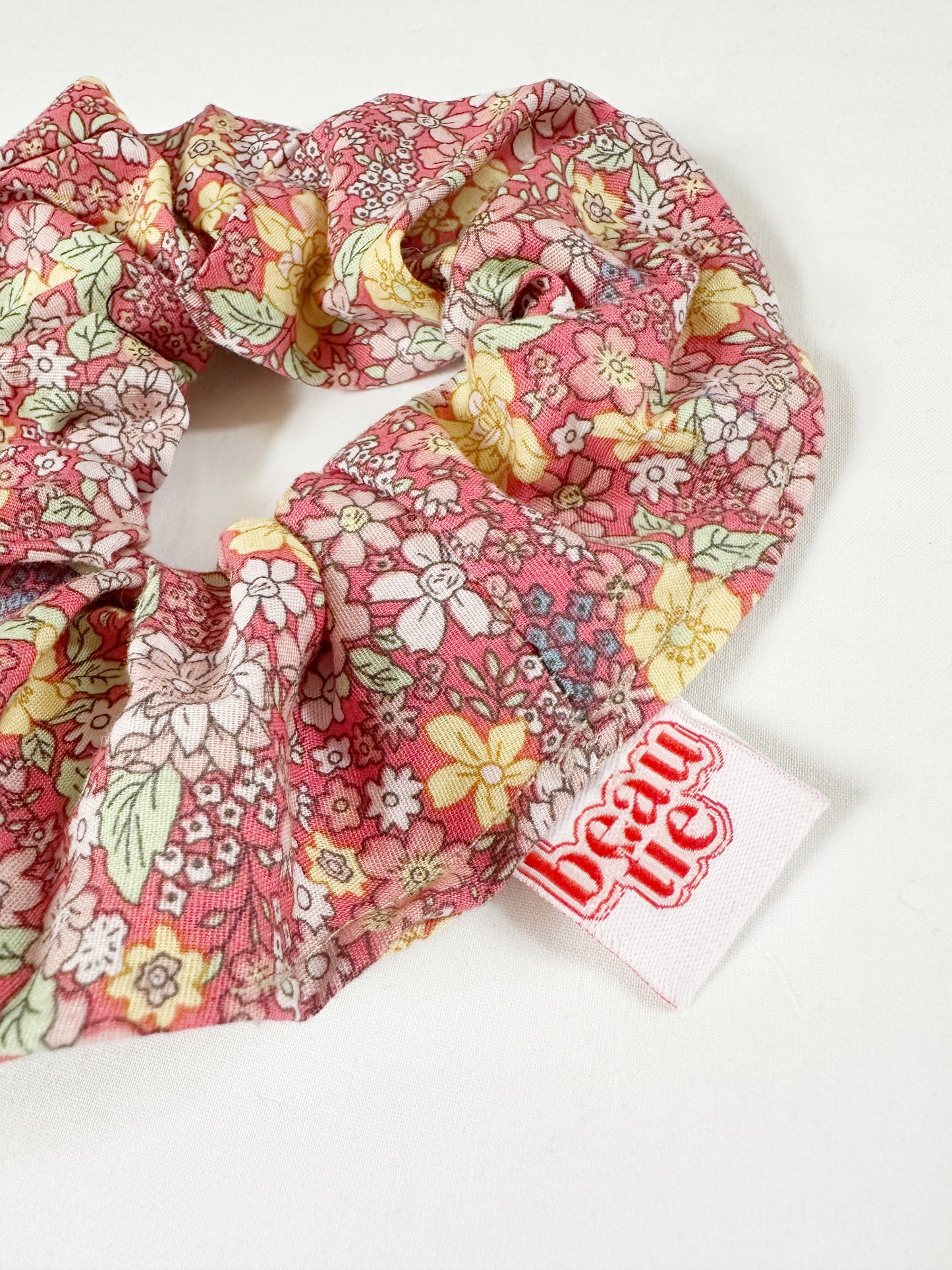 OG scrunchie in coral floral
