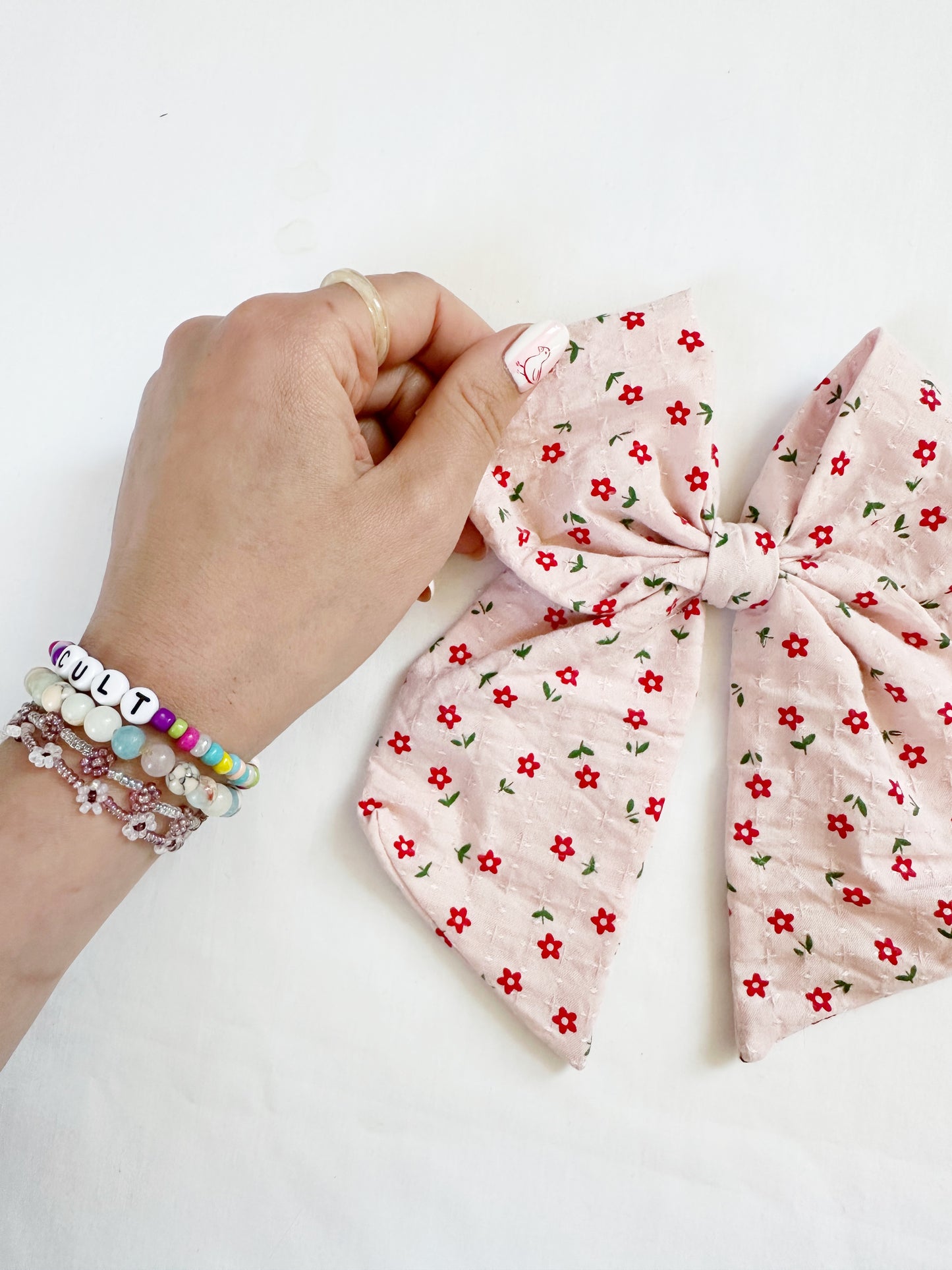 Beau hair bow in pink and red floral