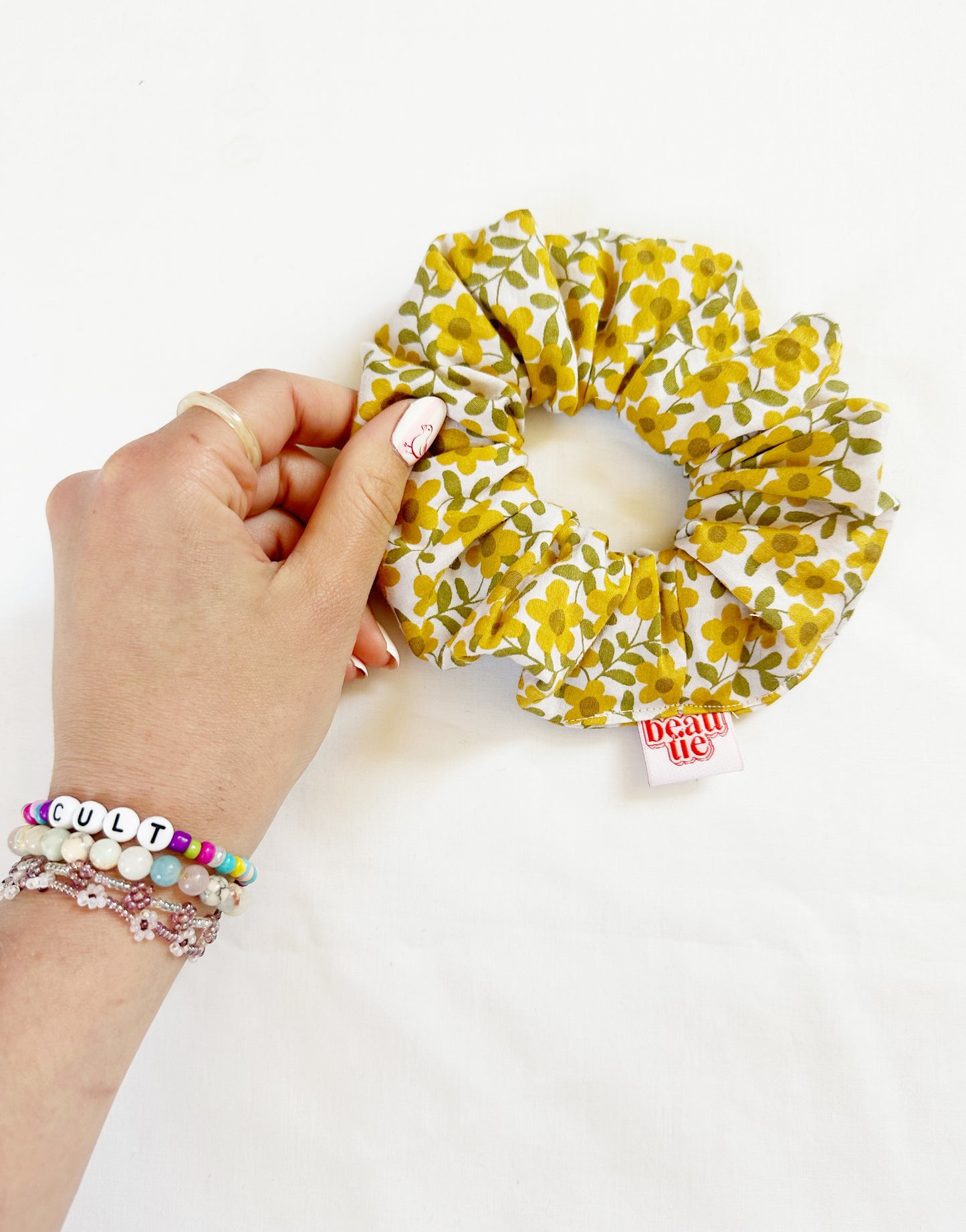 OG scrunchie in yellow floral