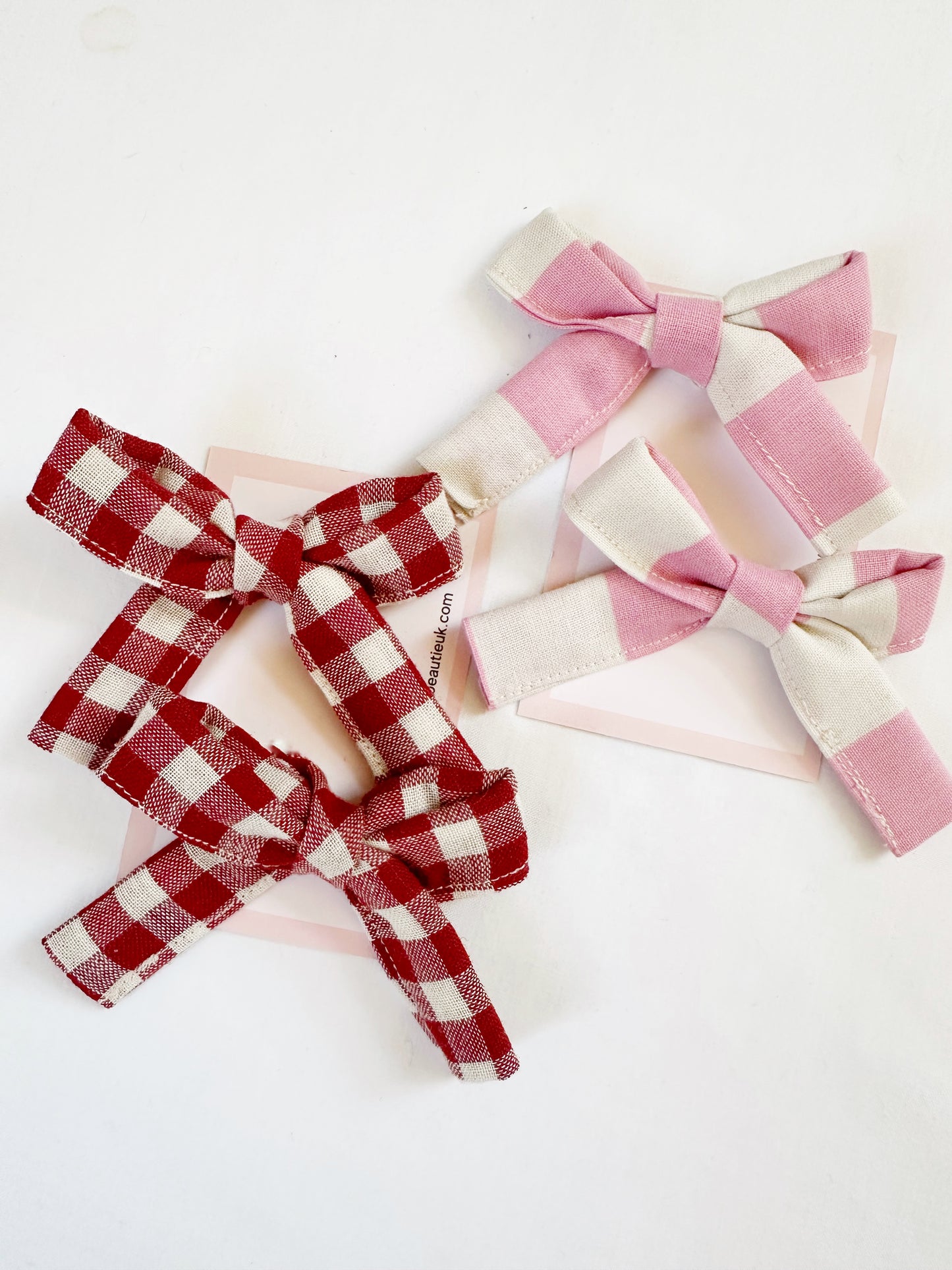 Bonnie mini hair bows in Penny candy stripe