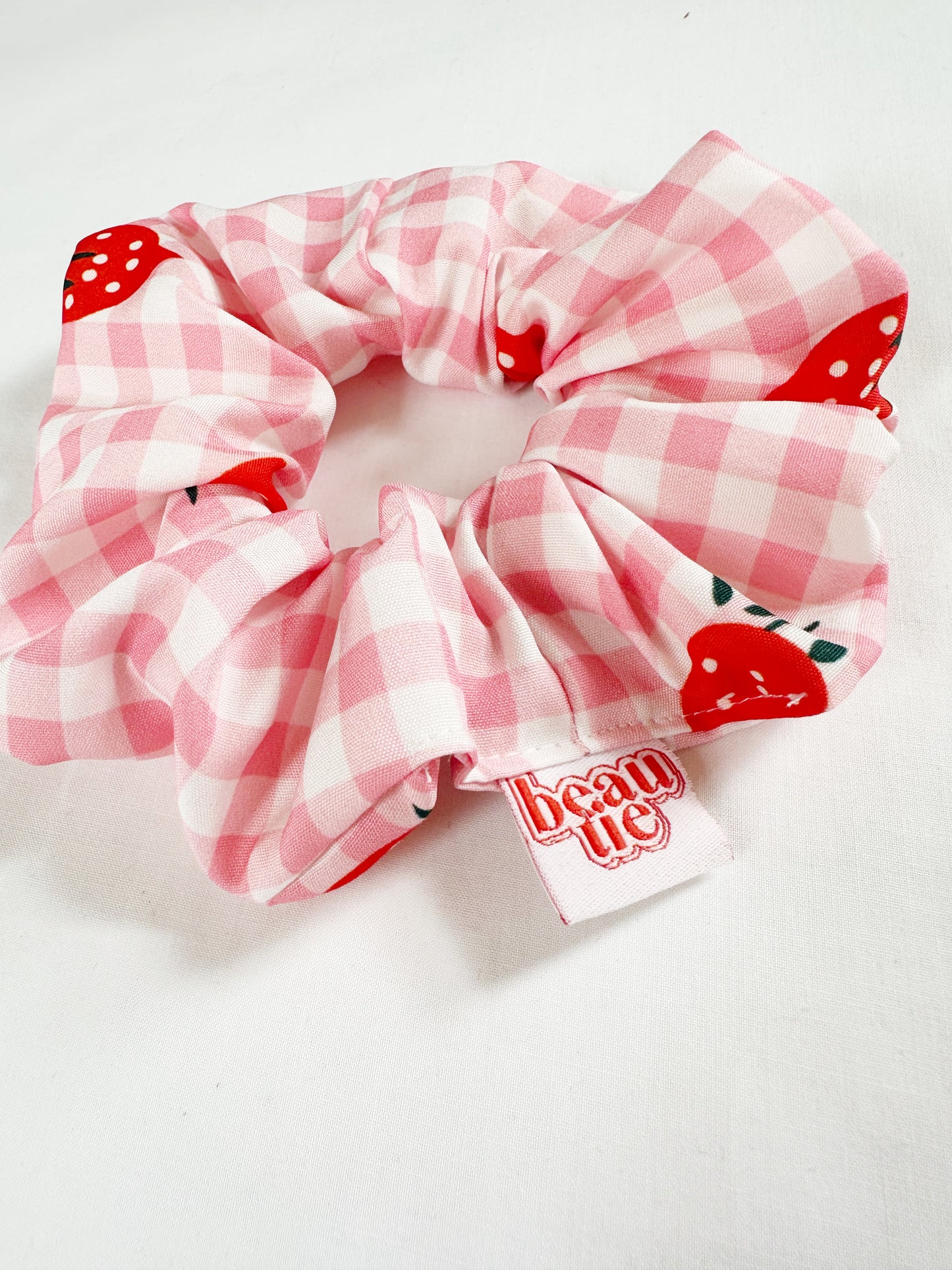 OG scrunchie in strawberry gingham