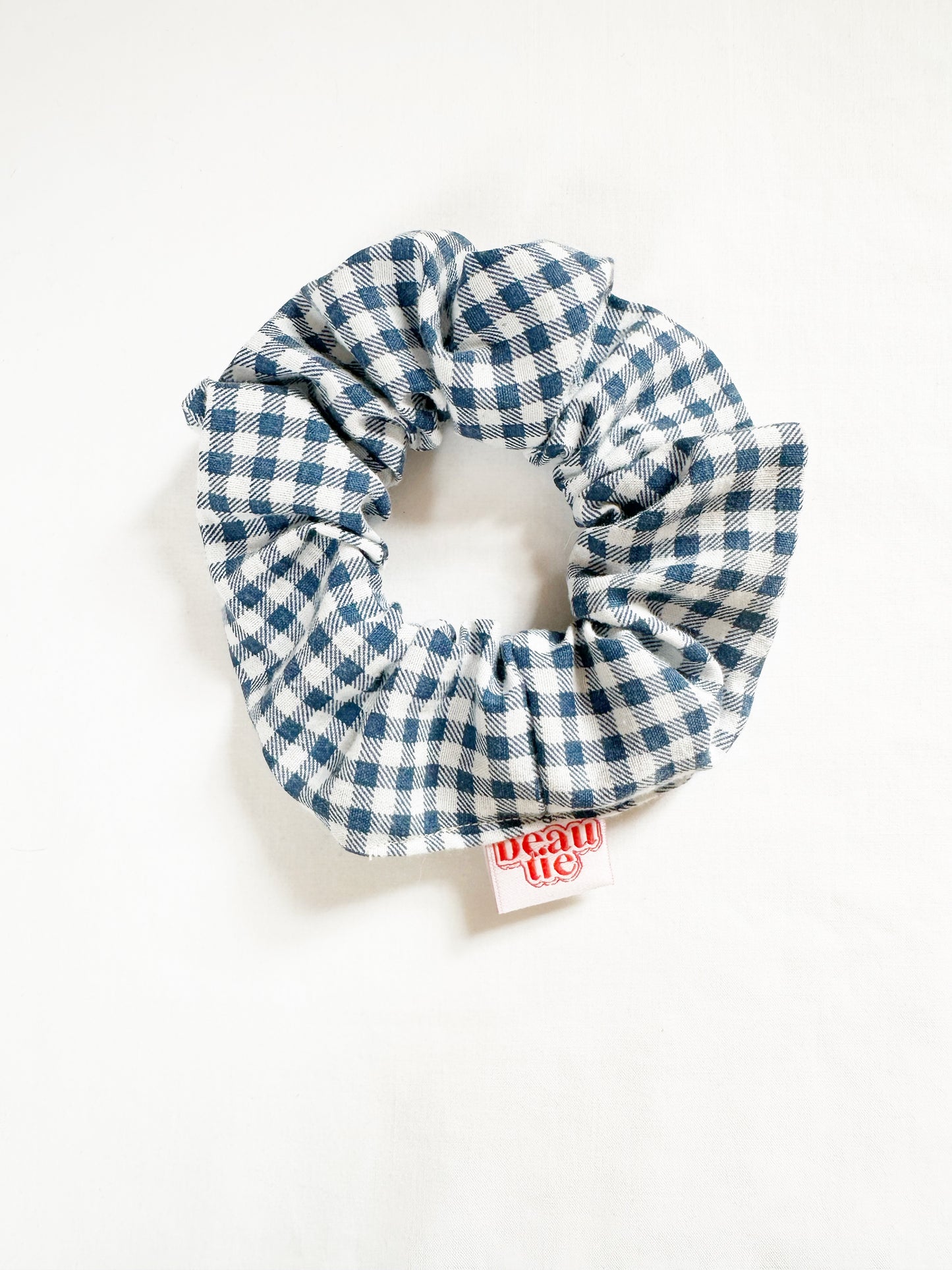 OG scrunchie in navy gingham