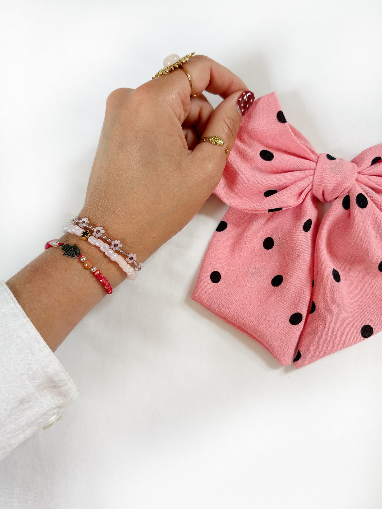 Beau hair bow in pink polka dot