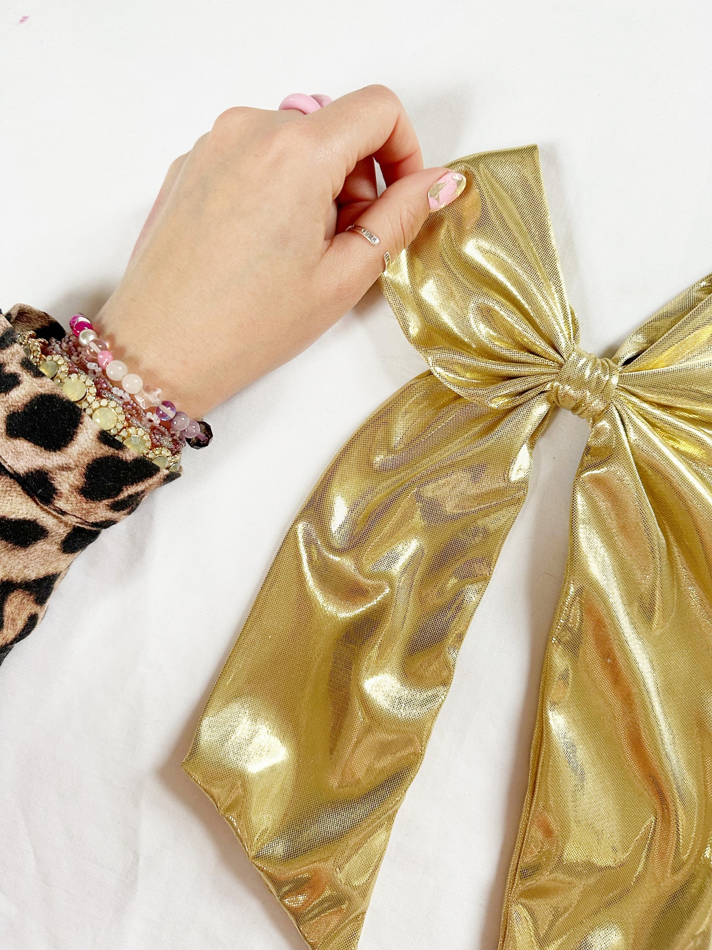Power Hair Bow in gold lamé