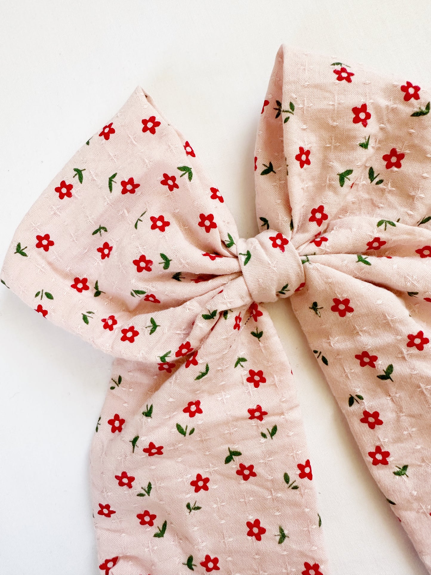 Beau hair bow in pink and red floral