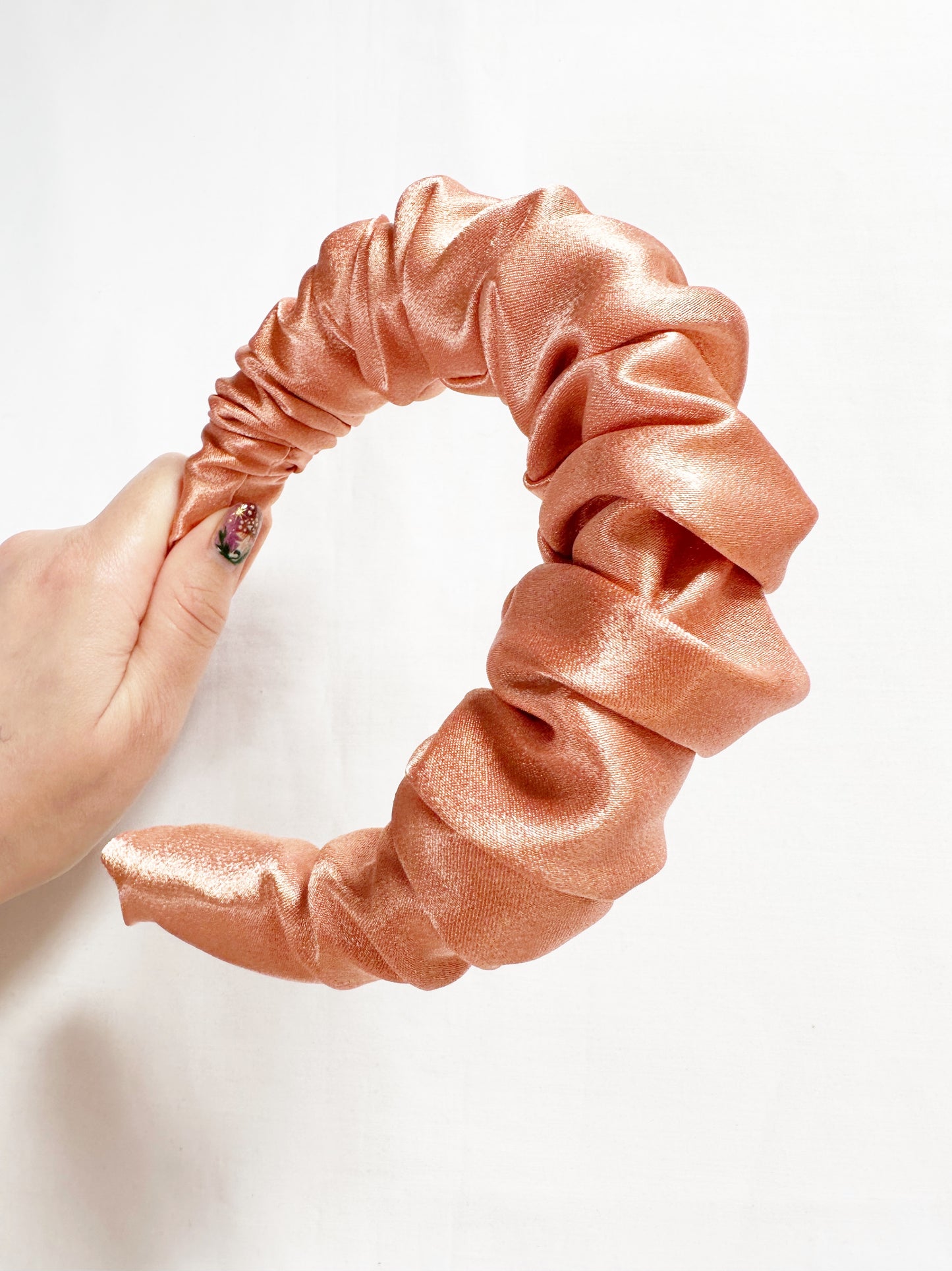 Ruffled Headband in pearly peach satin
