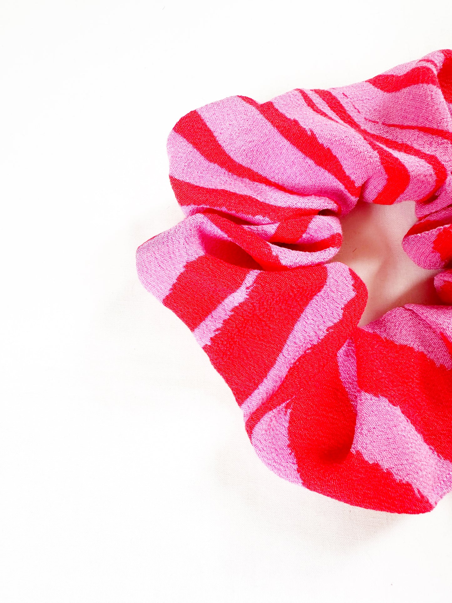 OG scrunchie in pink zebra print