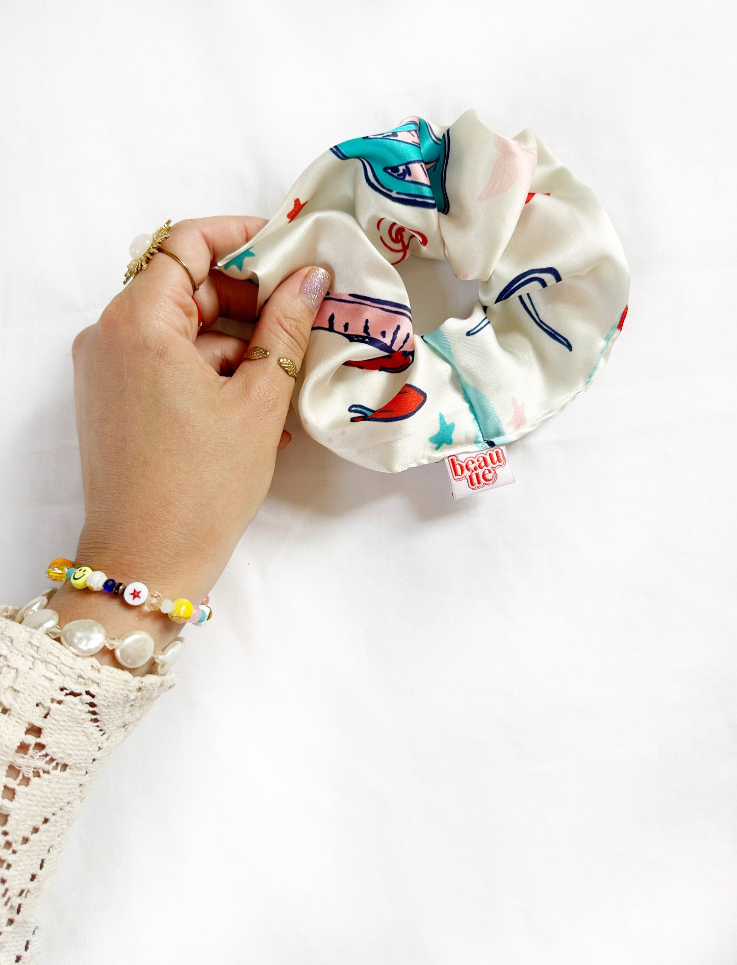 The OG scrunchie in silky sardine