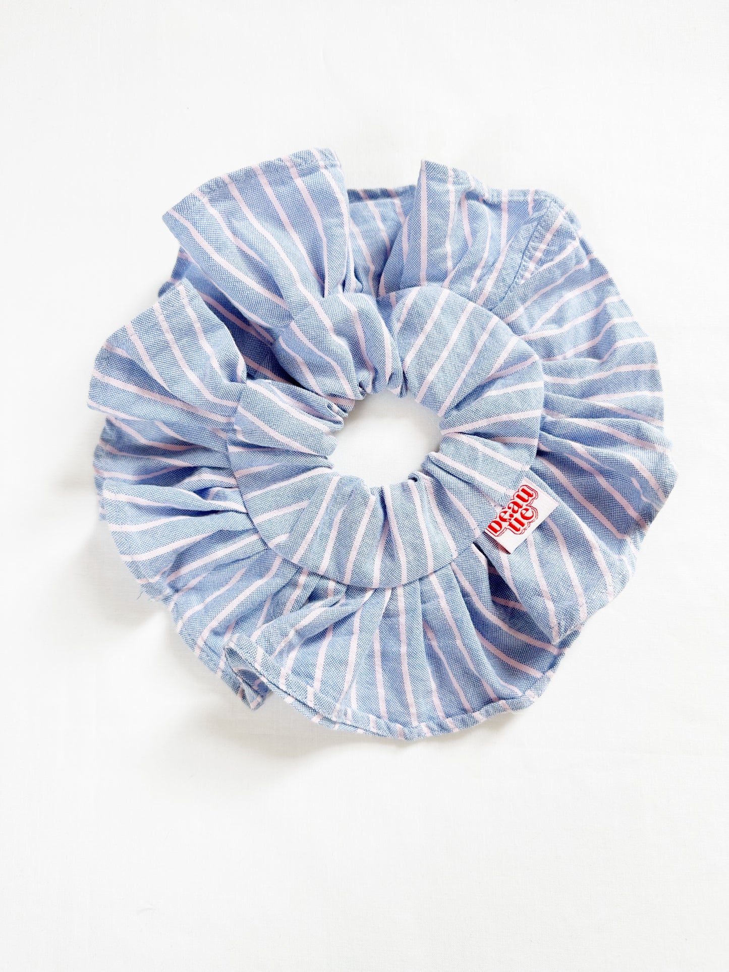 Mini ruffle scrunchie in blue and pink stripe cotton