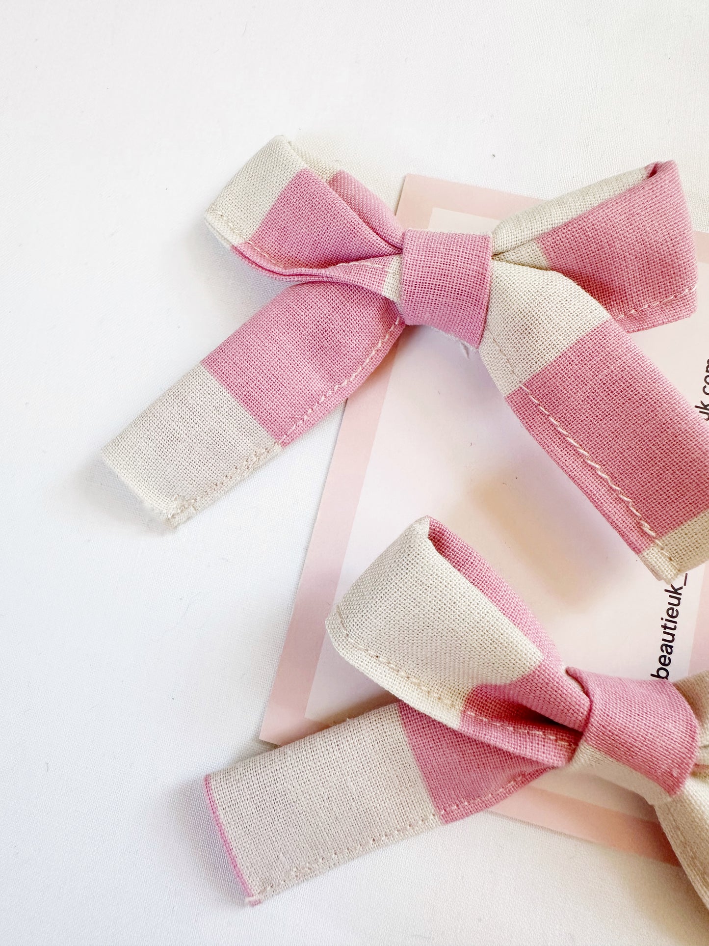 Bonnie mini hair bows in Penny candy stripe