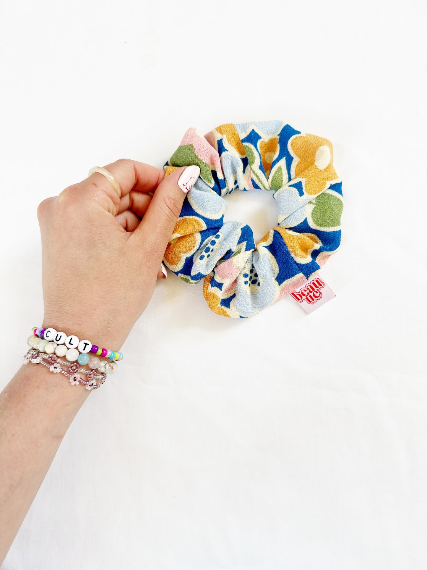 OG scrunchie in blue orange floral