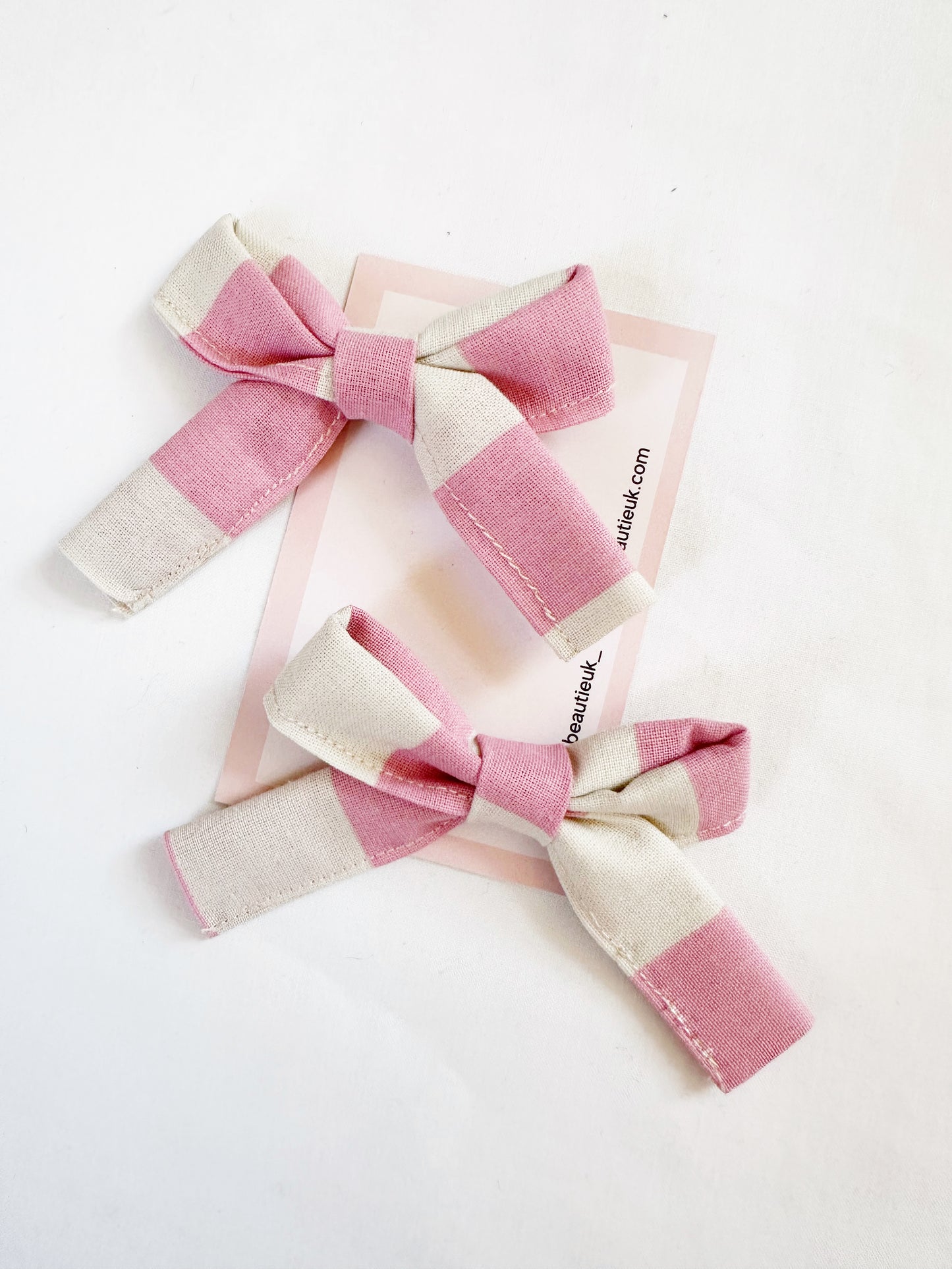 Bonnie mini hair bows in Penny candy stripe