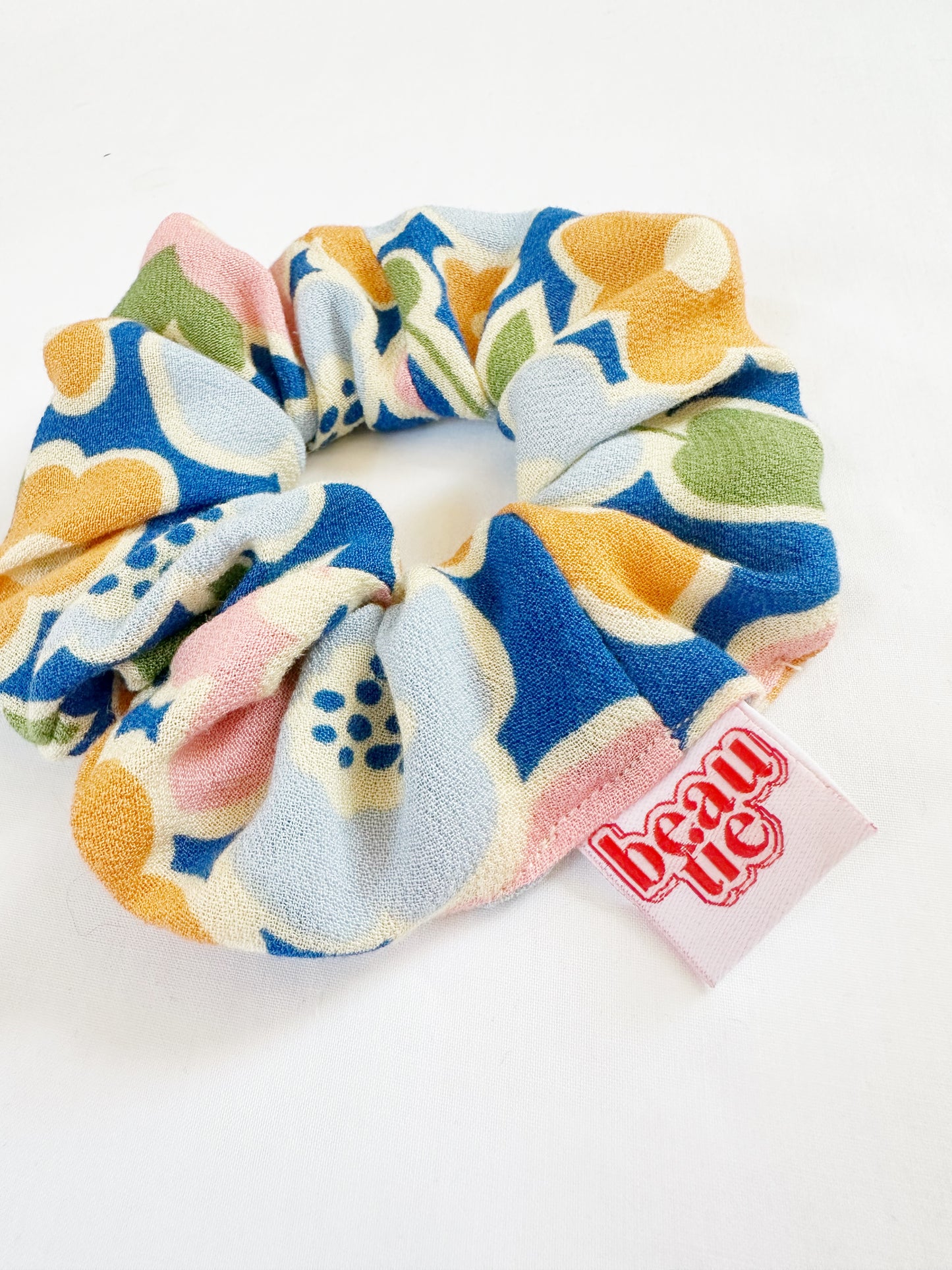 OG scrunchie in blue orange floral
