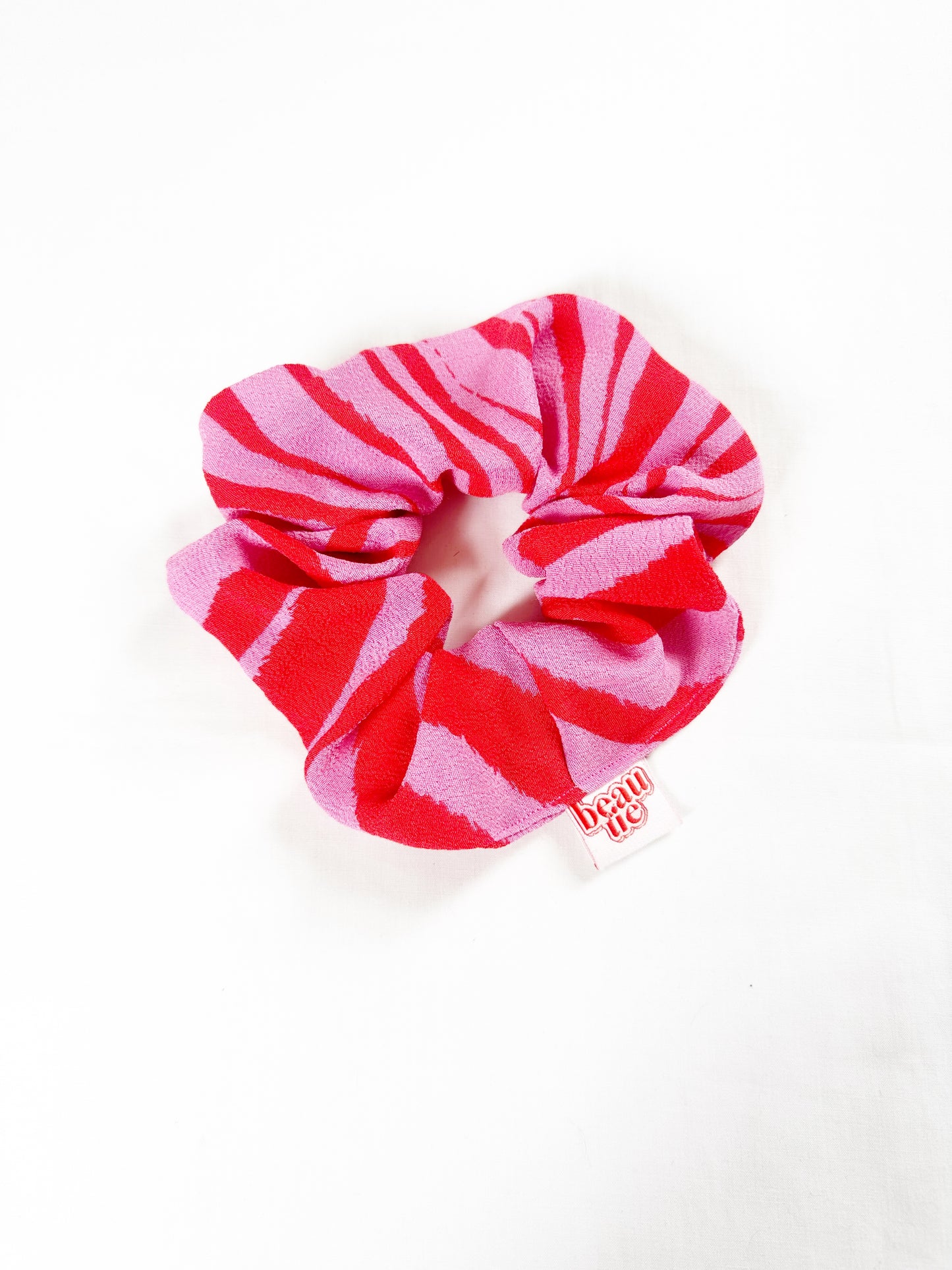 OG scrunchie in pink zebra print