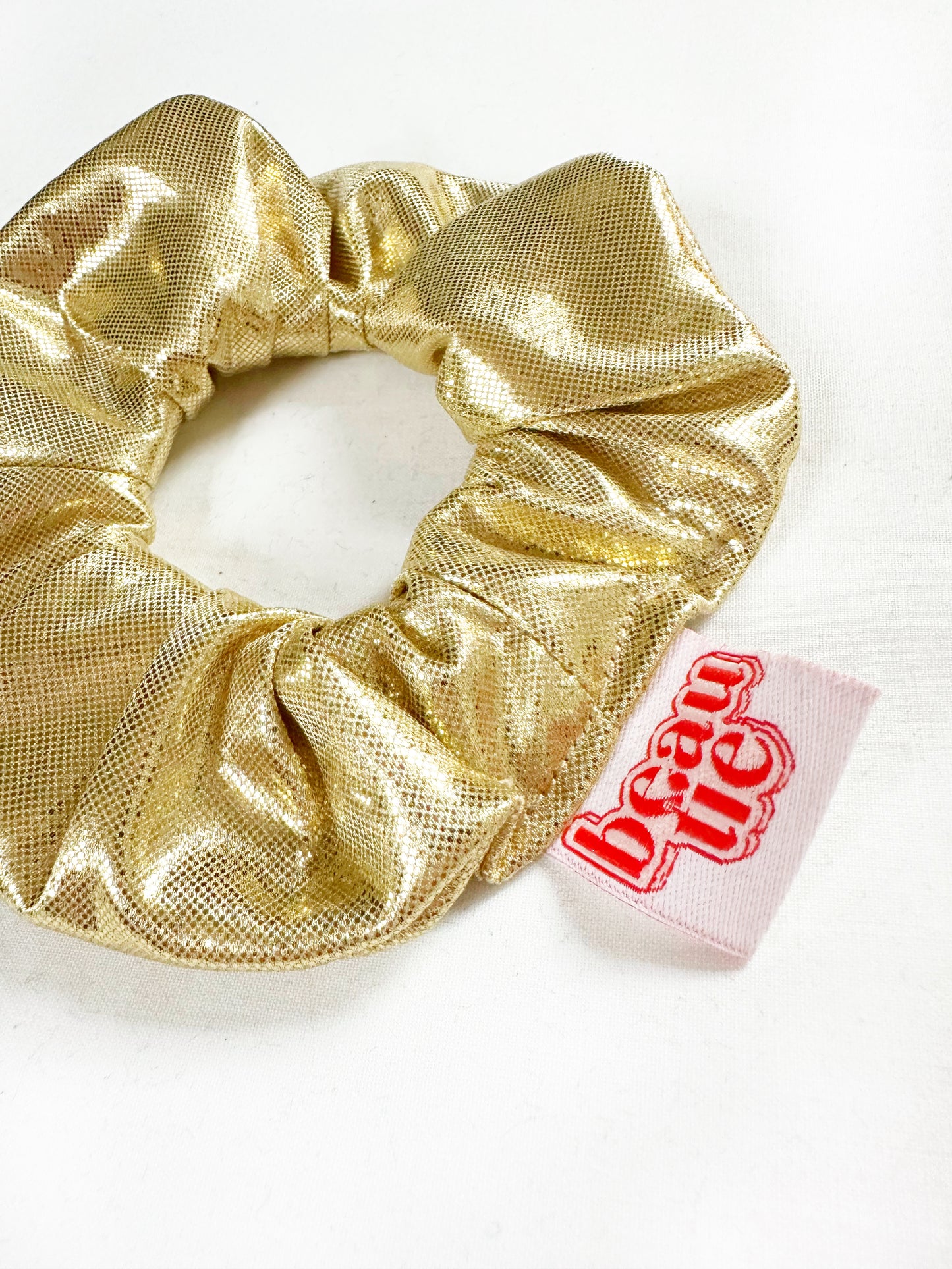 Mini scrunchie in gold