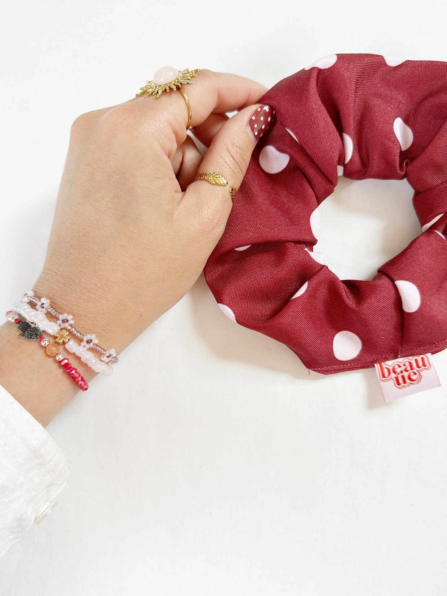 OG scrunchie in burgundy polka dot