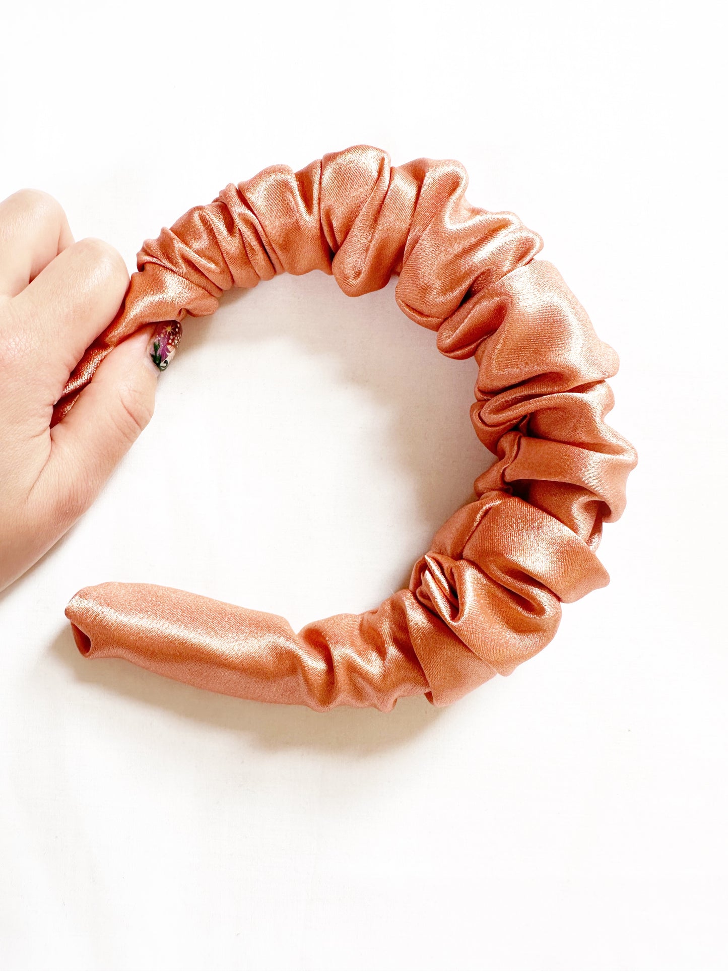Ruffled Headband in pearly peach satin