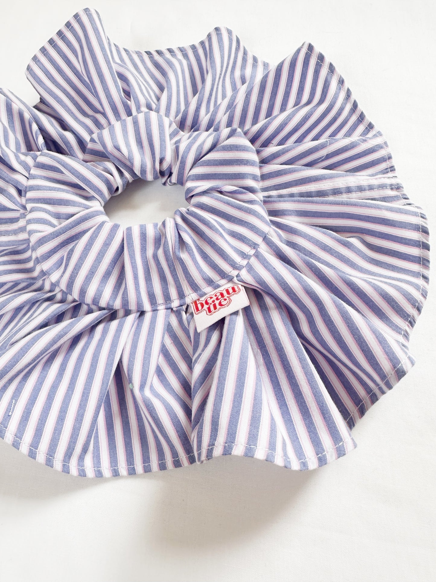 Mini ruffle scrunchie in blue and white stripe cotton