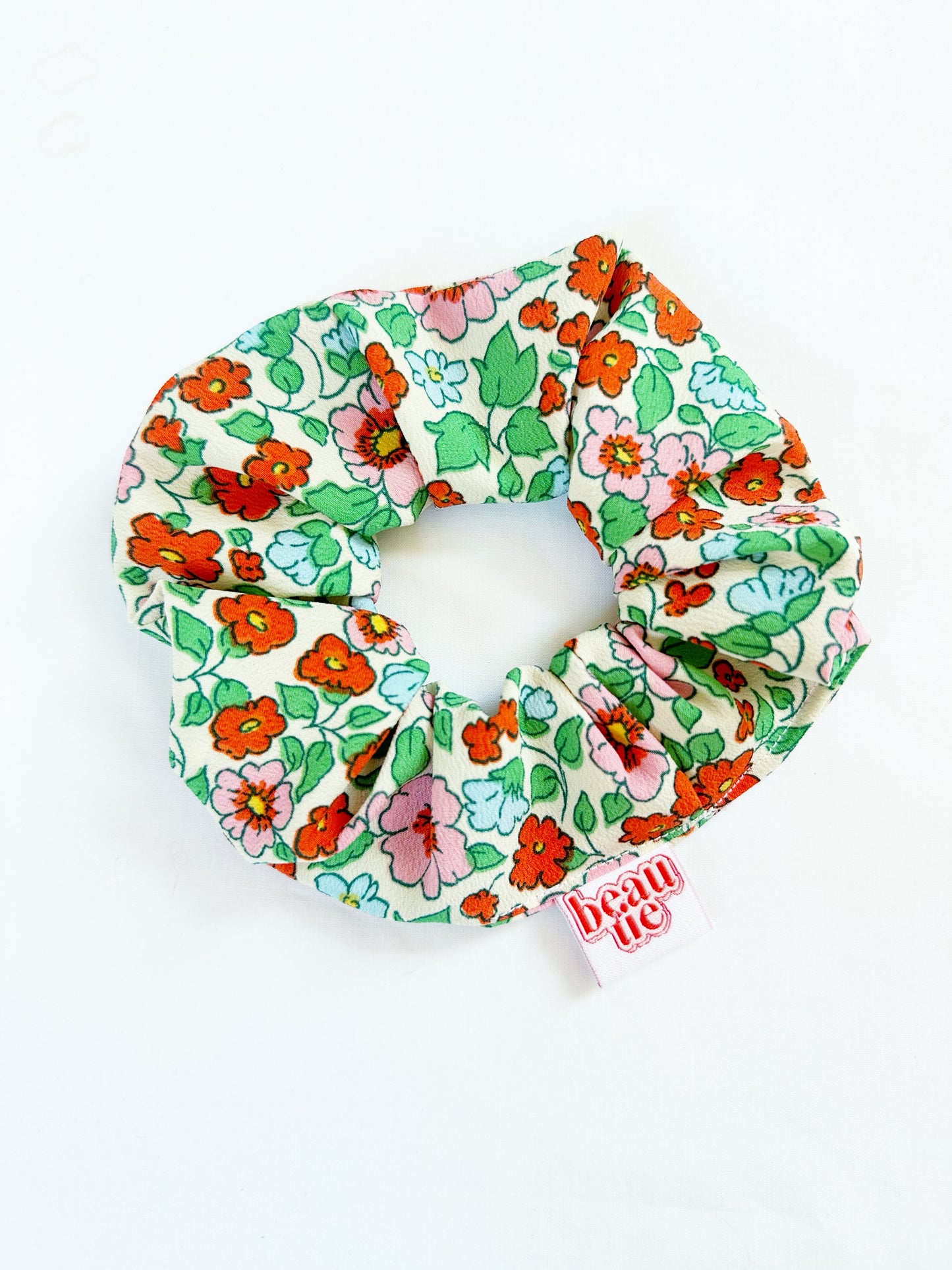 OG scrunchie in bright floral