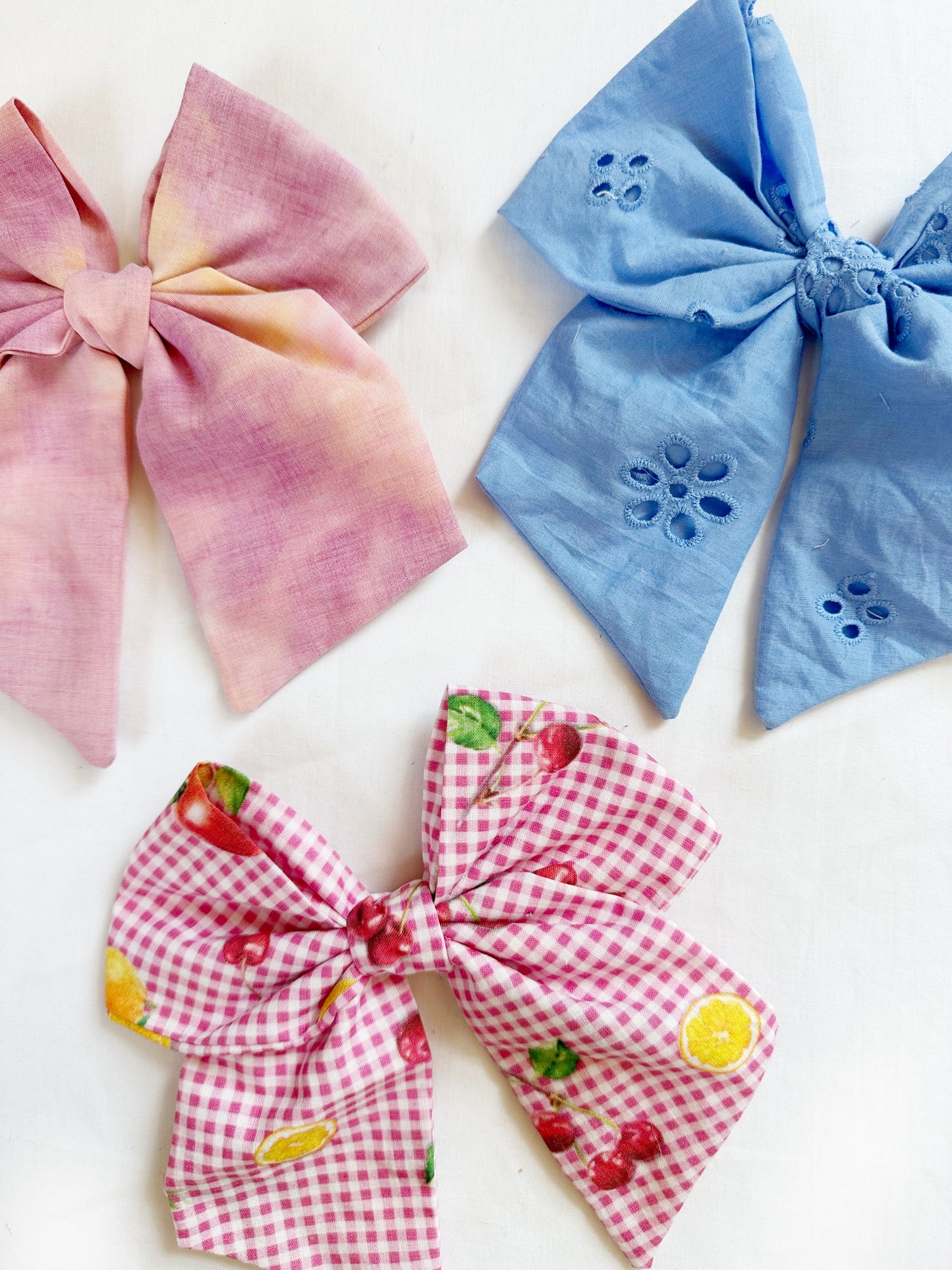 Beau hair bow in sunset tie dye cotton