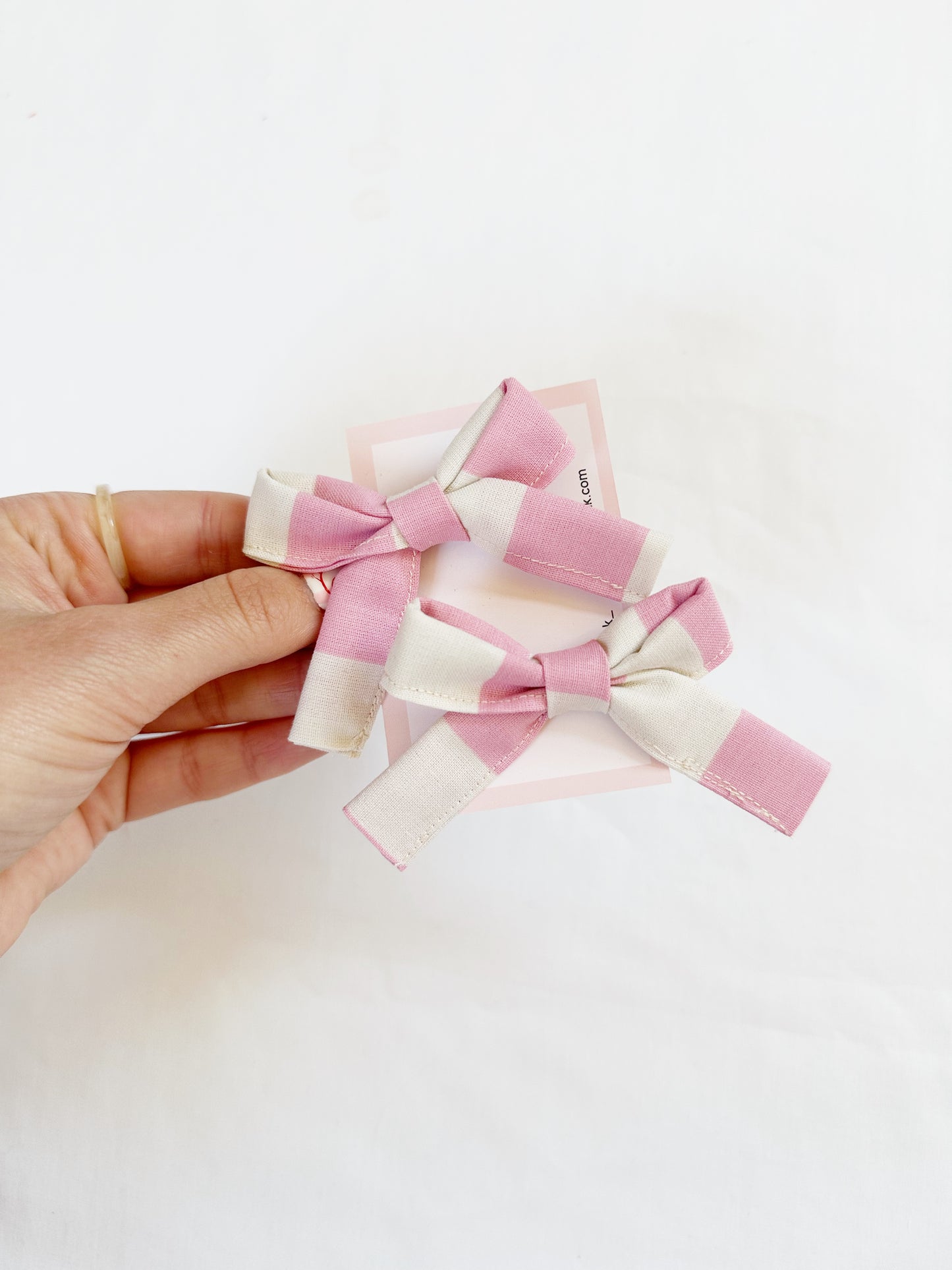 Bonnie mini hair bows in Penny candy stripe