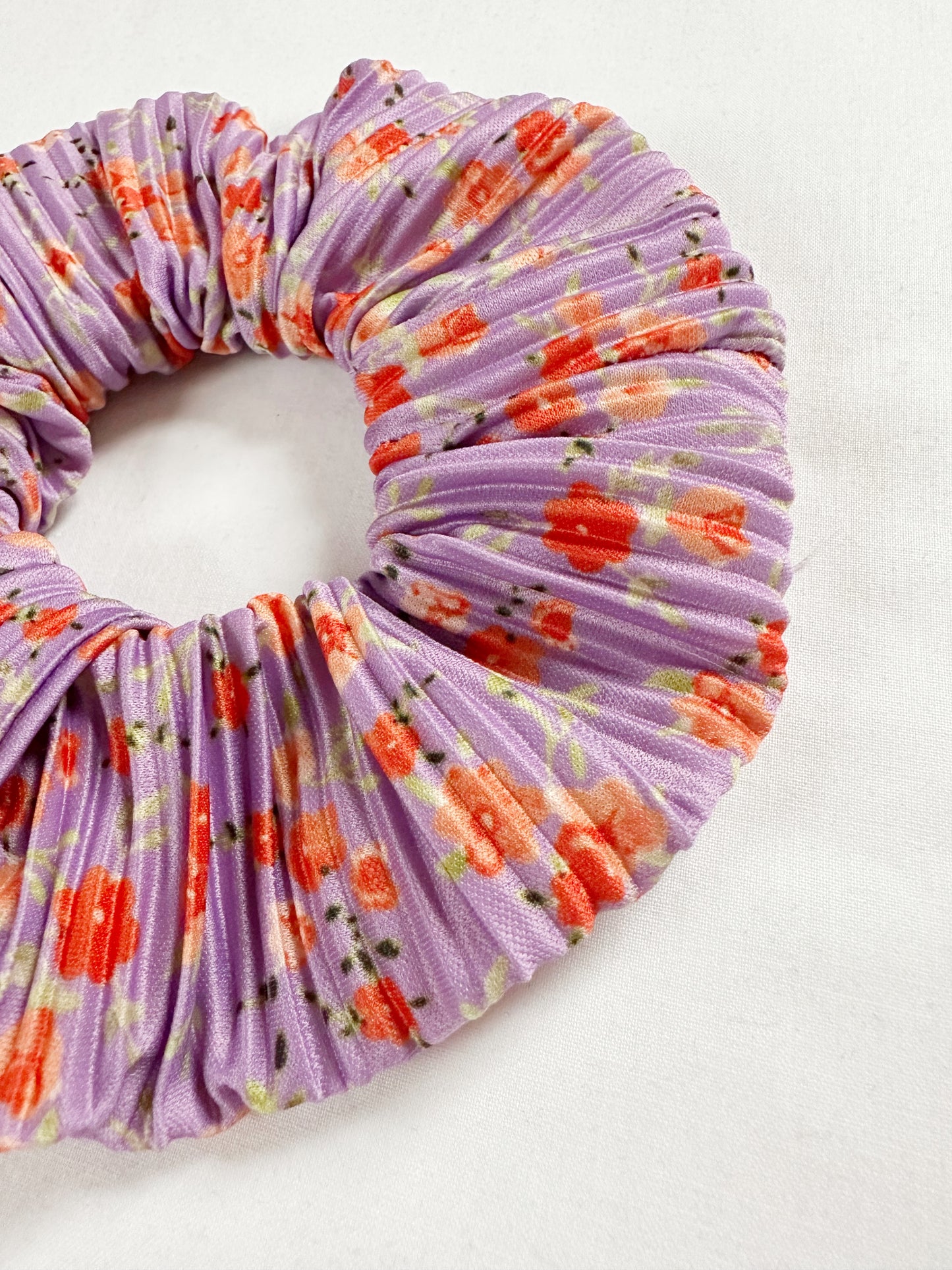 OG scrunchie in lilac orange floral plisse