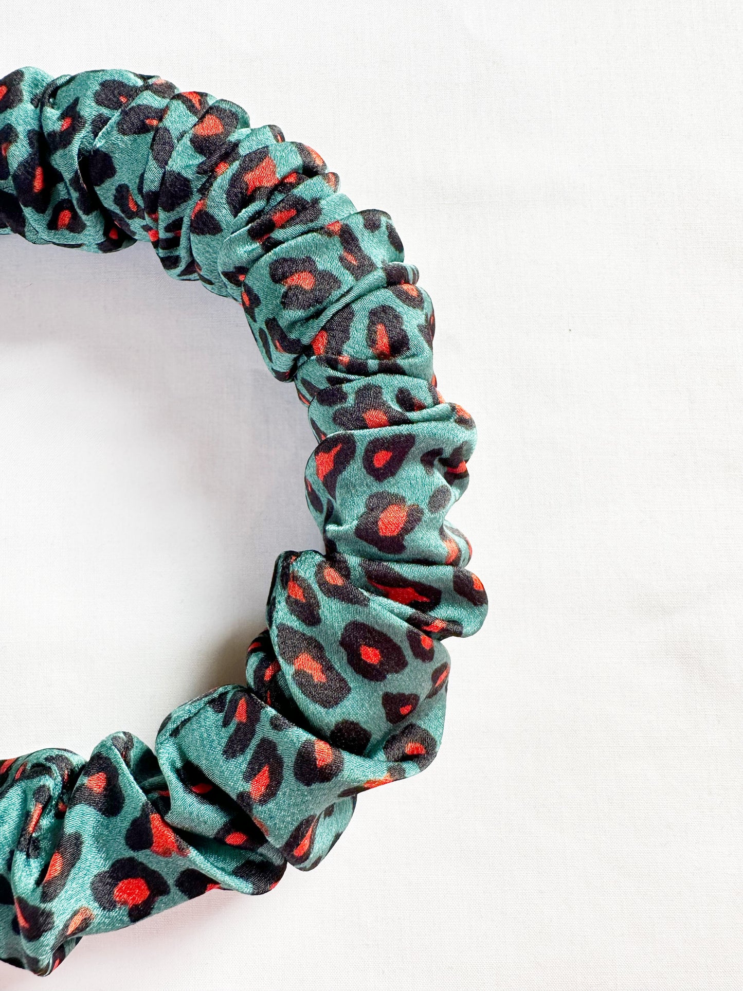 Ruffled Headband in green leopard silk