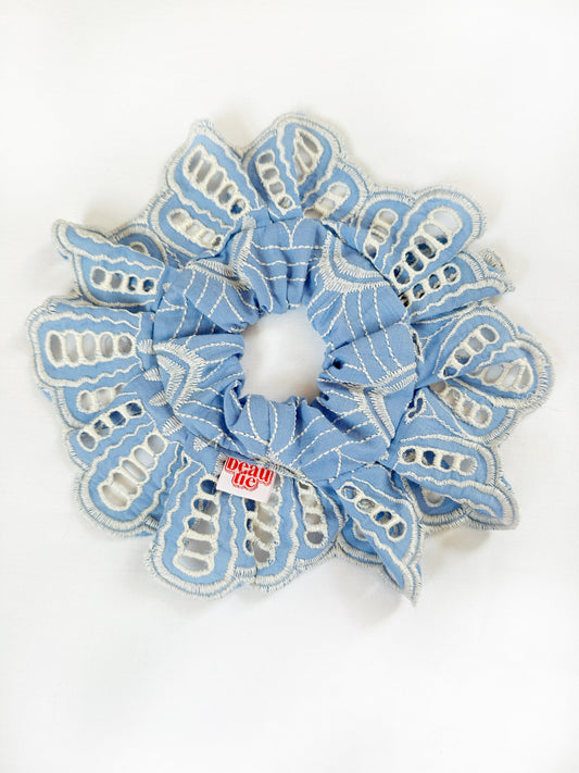 OG ruffled scrunchie in blue and white broderie