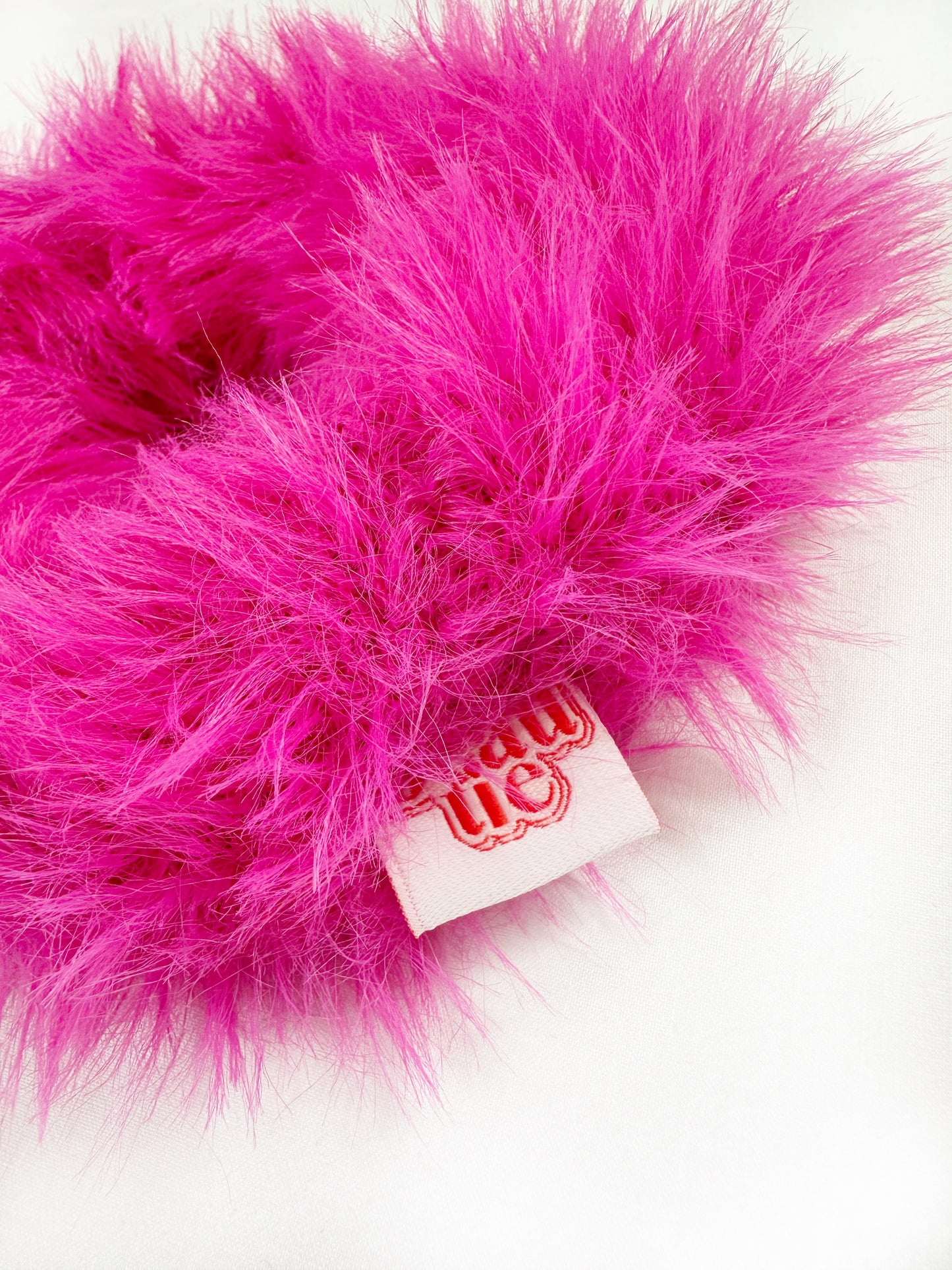 Oversized pink fluffy scrunchie
