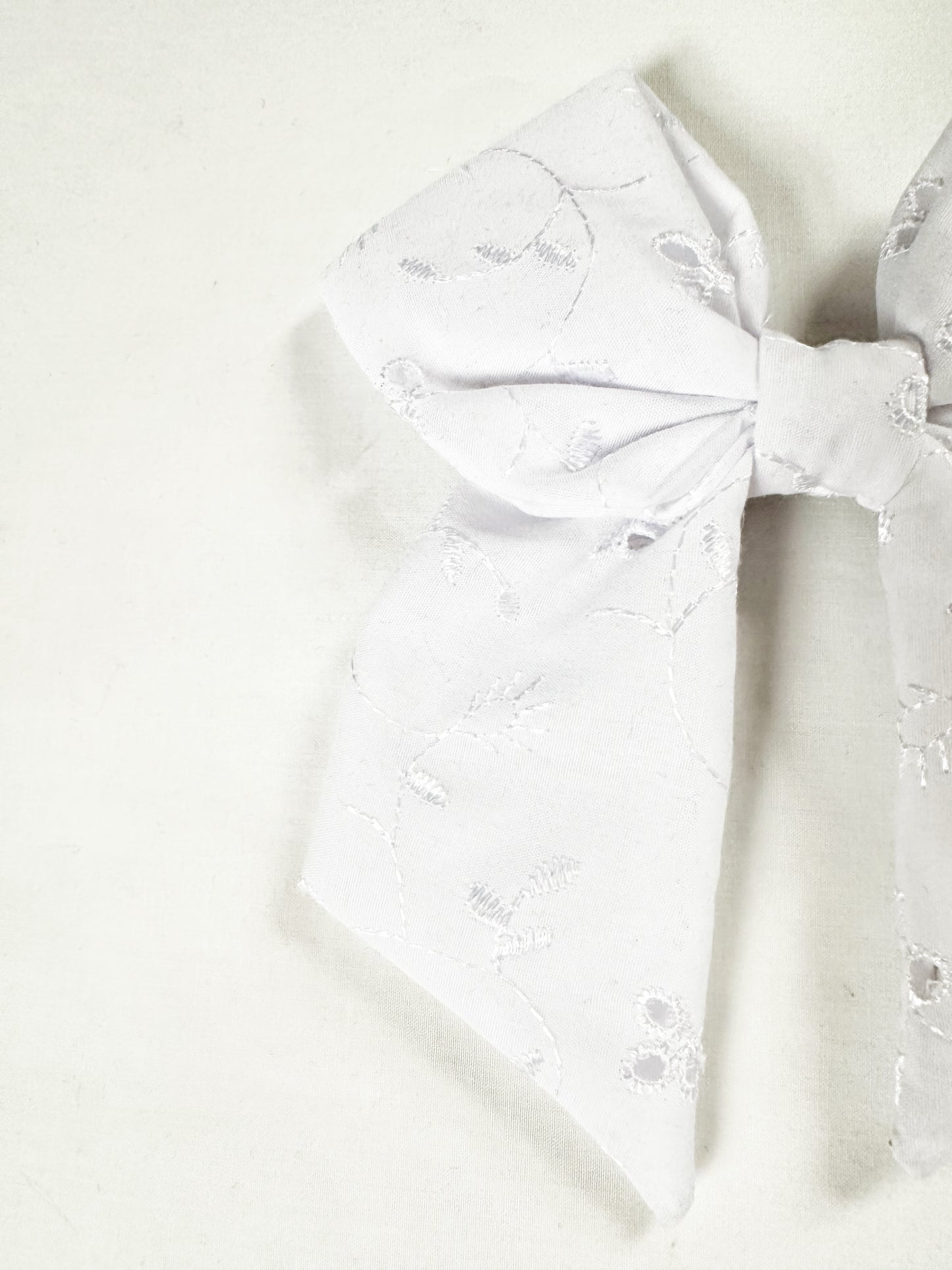 Hair Bow in white broderie