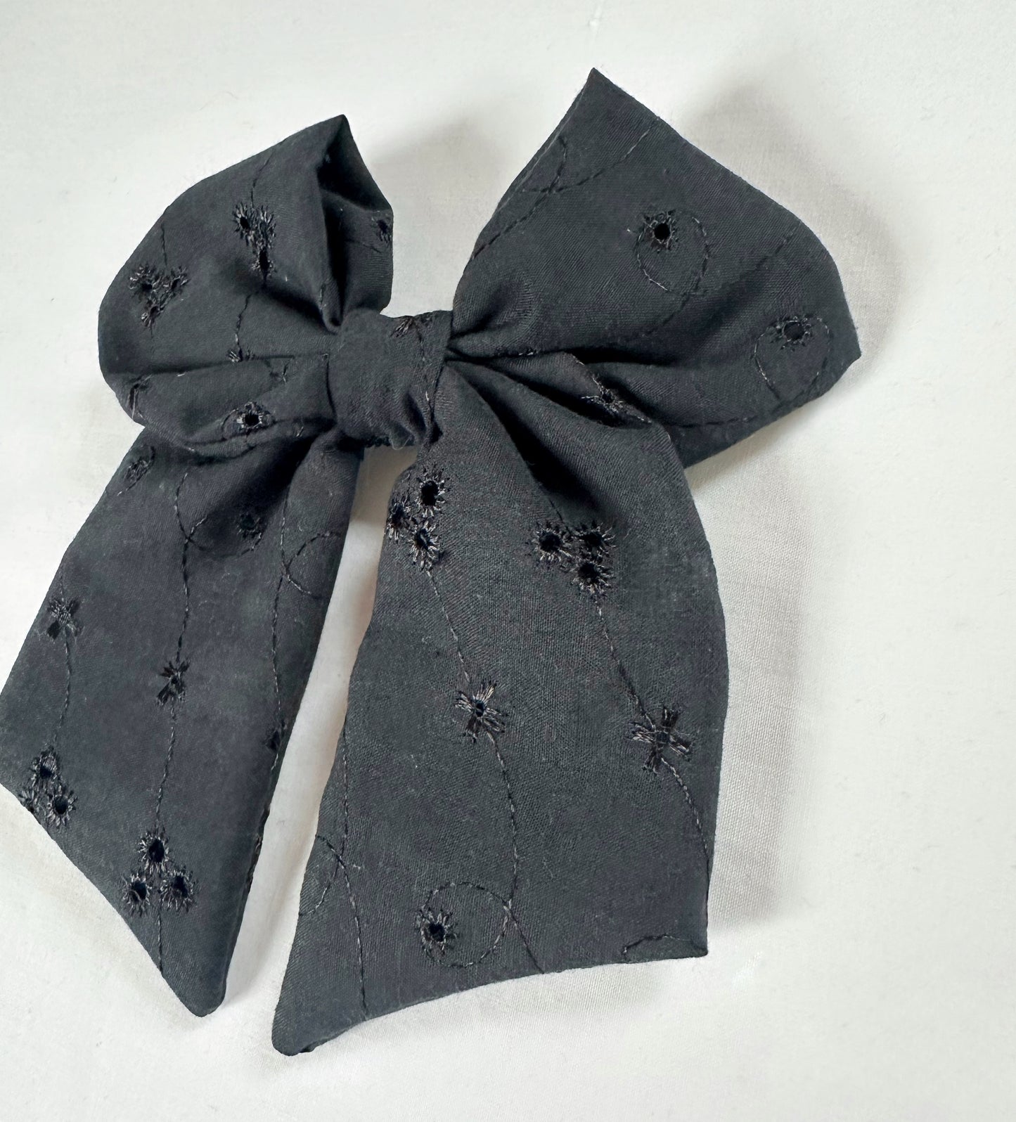 Hair Bow in black broderie