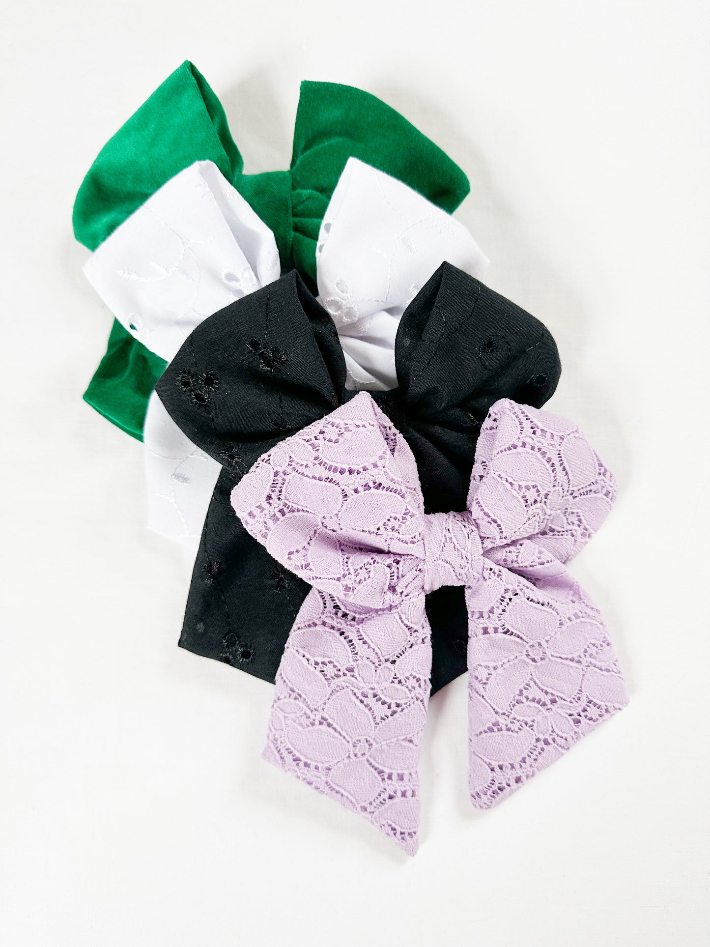 Hair Bow in black broderie