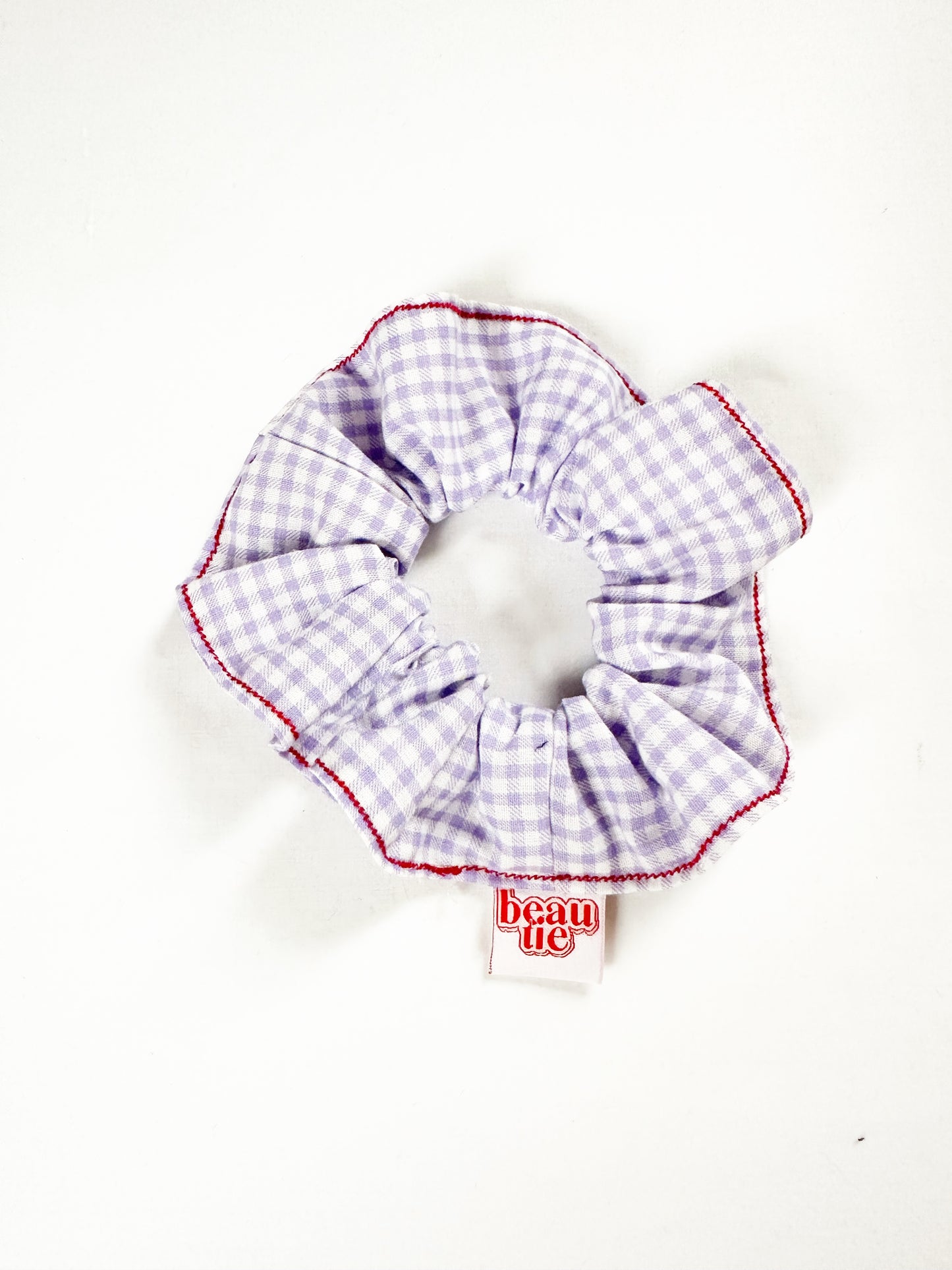 OG scrunchie in gingham and red stitch