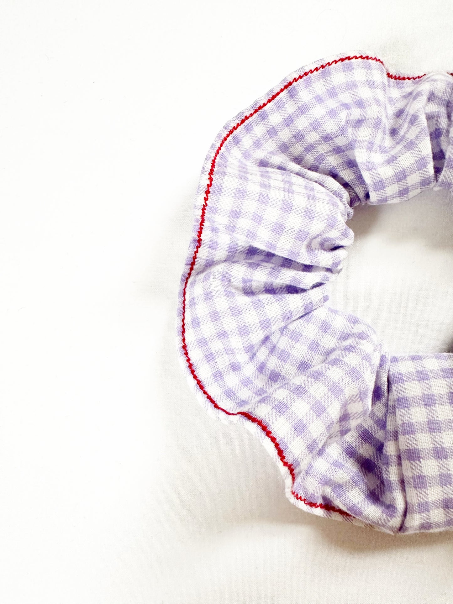 OG scrunchie in gingham and red stitch