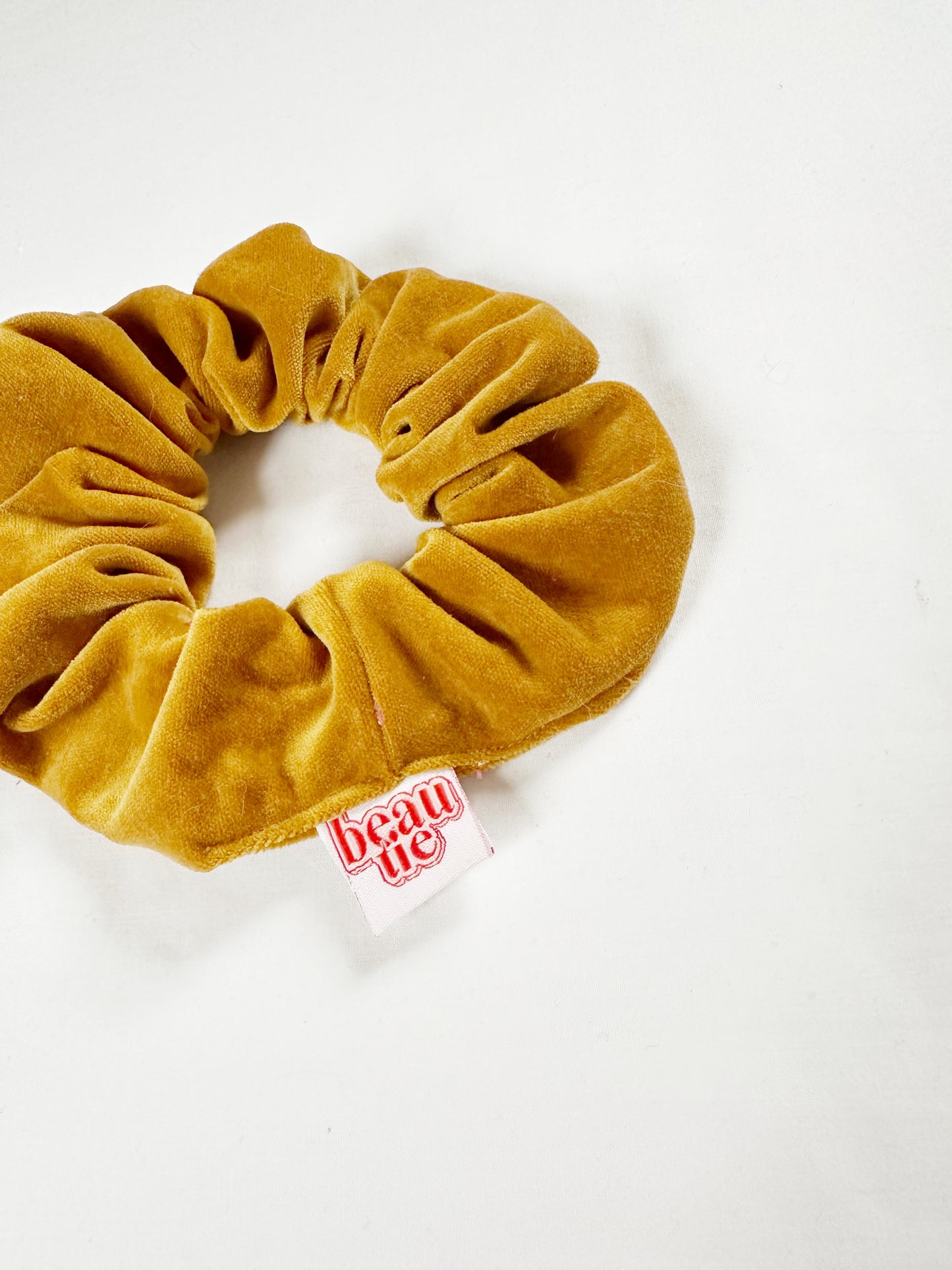 OG scrunchie in mustard yellow velvet