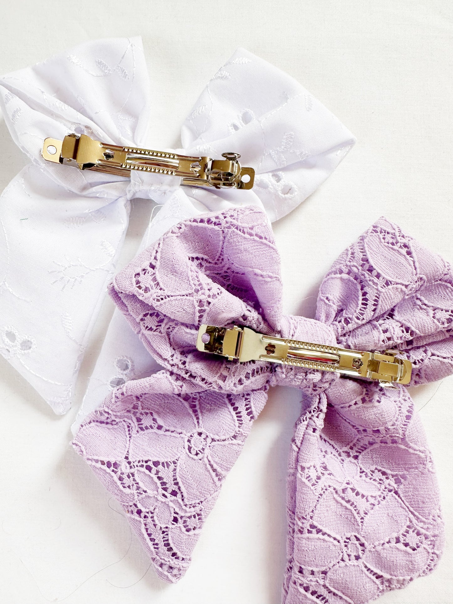 Hair Bow in black broderie