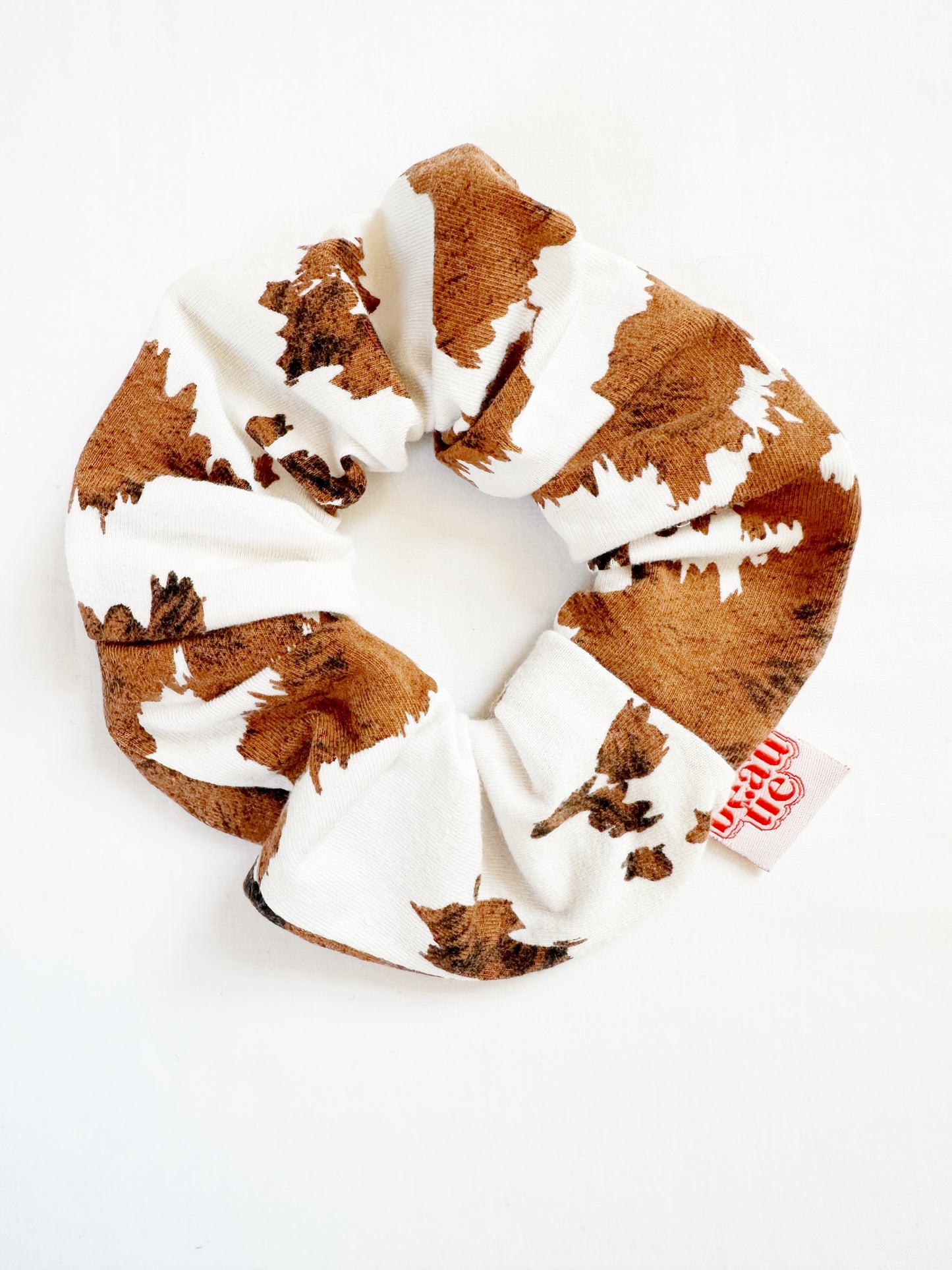 OG scrunchie in cow print