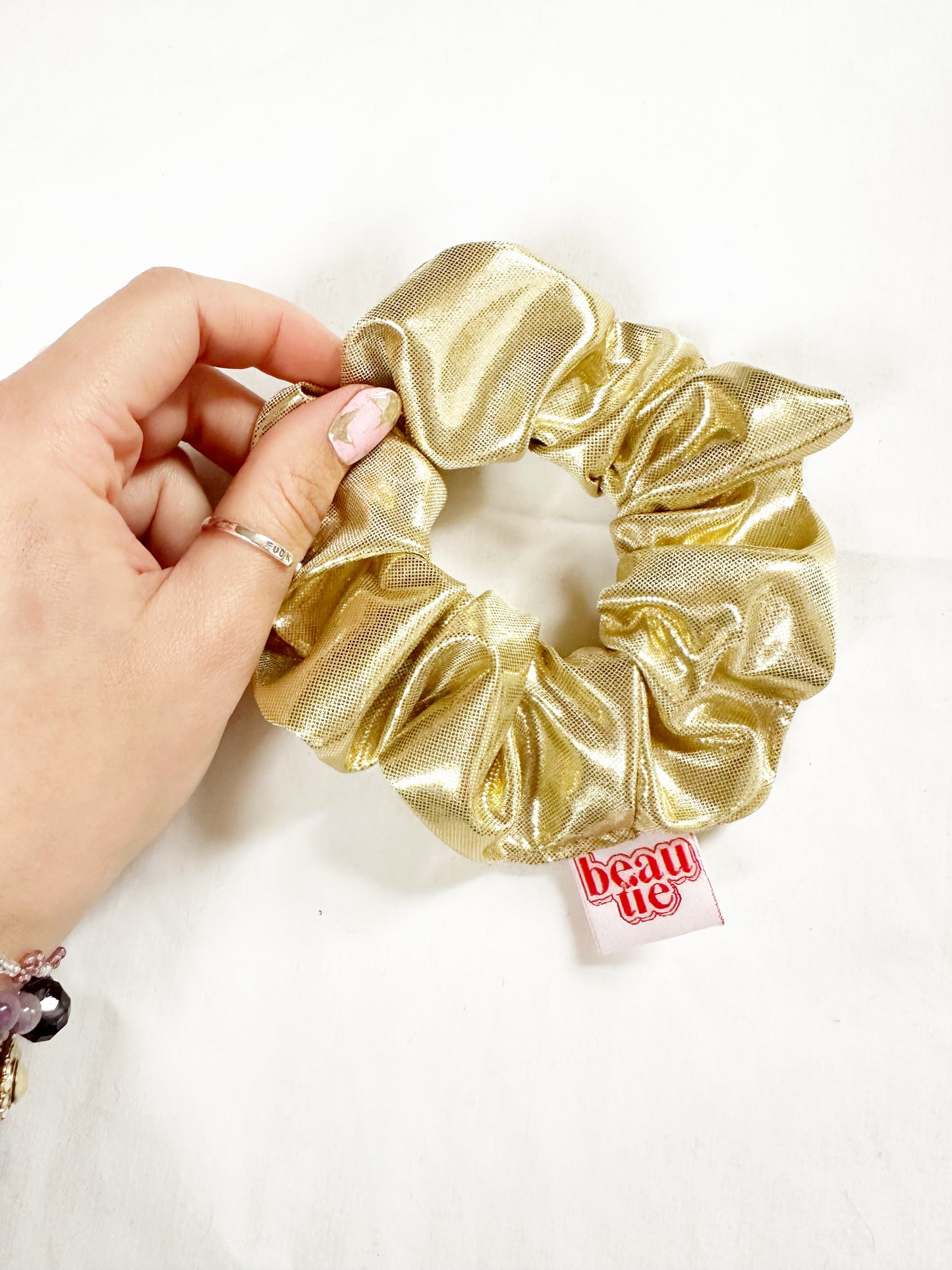 OG scrunchie in gold lamé