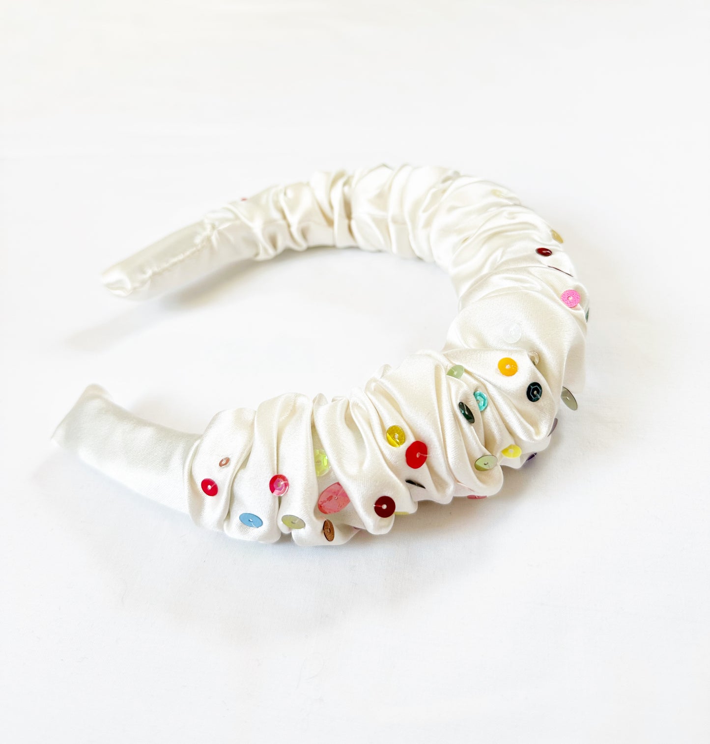 The Confetti - Ruffle Headband in ivory silk with mixed colour sequins