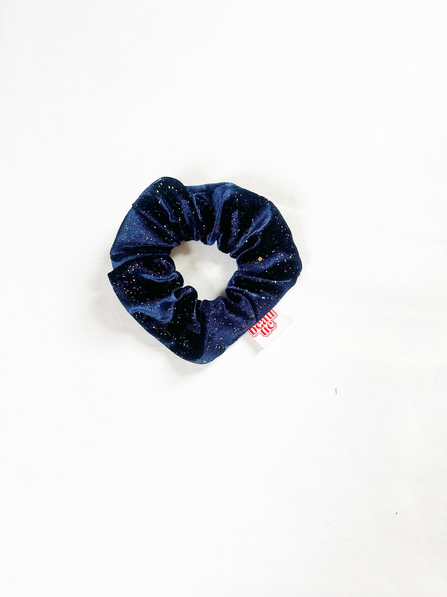 Mini scrunchie in blue glitter velvet