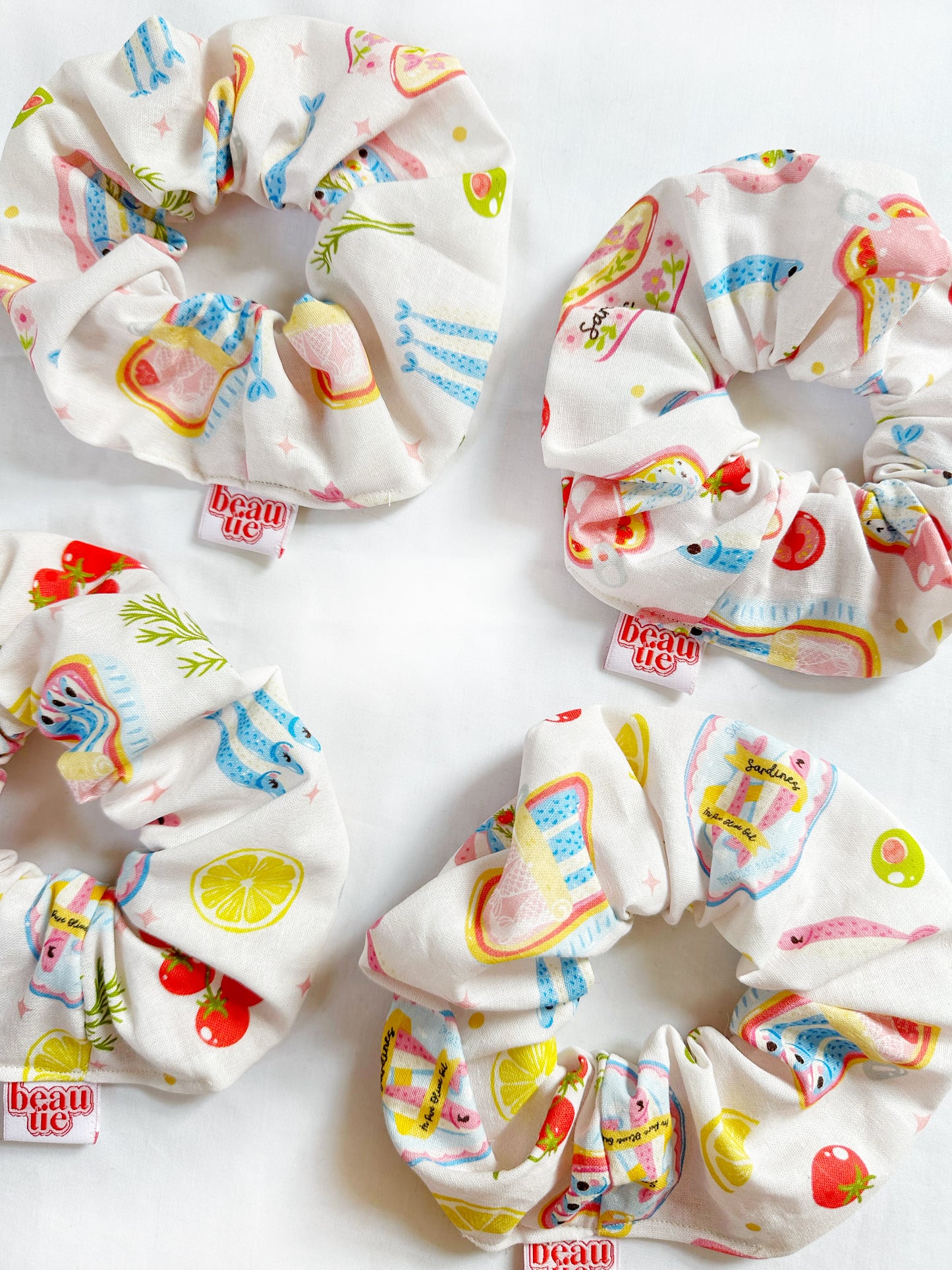 The OG scrunchie in pastel sardine