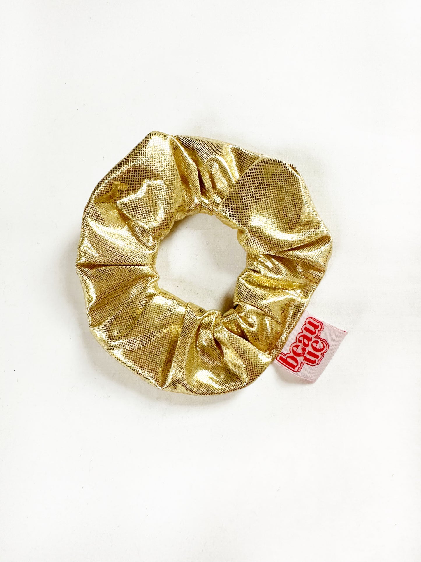 Mini scrunchie in gold