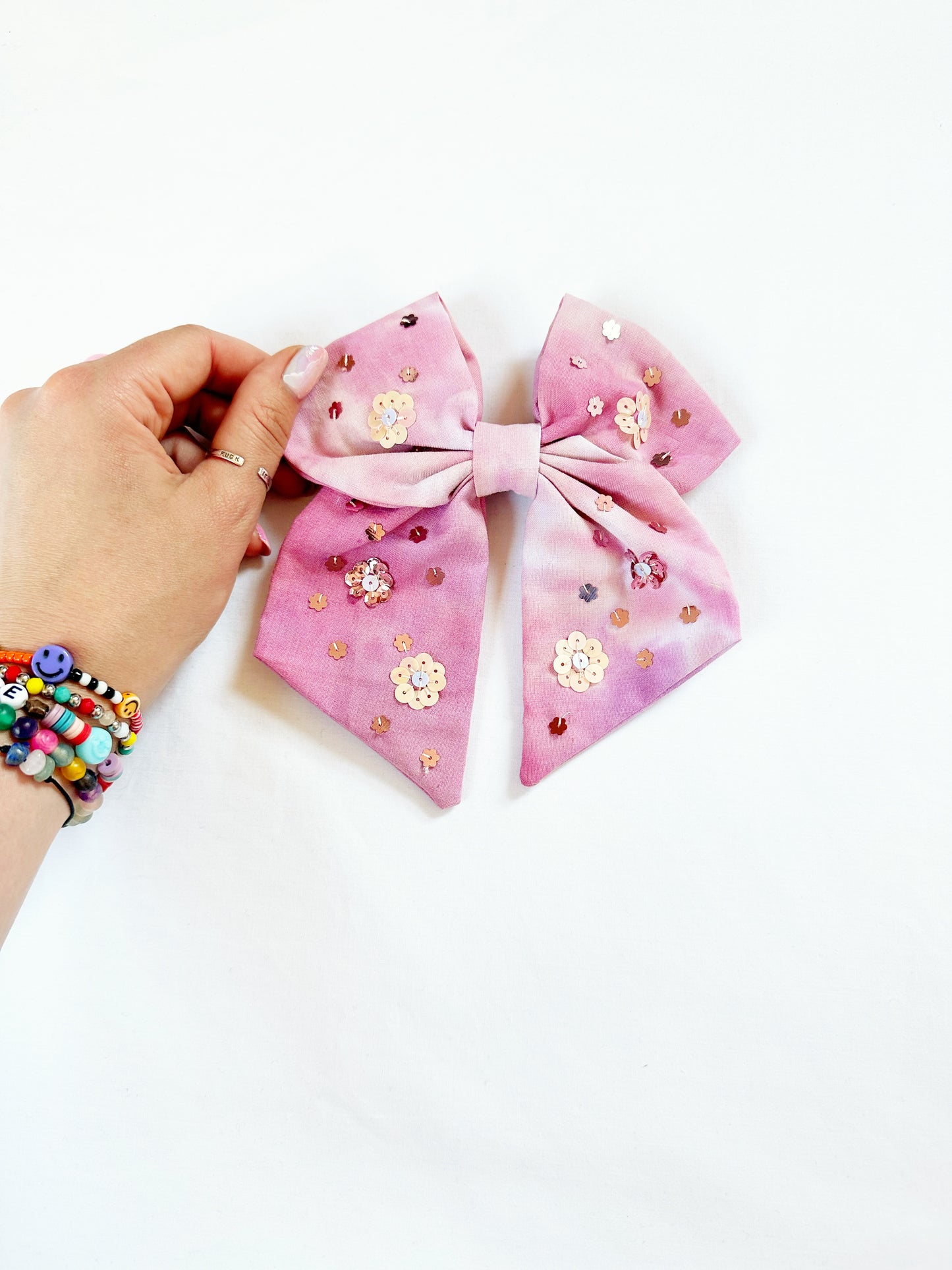 The Queen Bee - Hair Bow in pink tie dye with sequin flowers