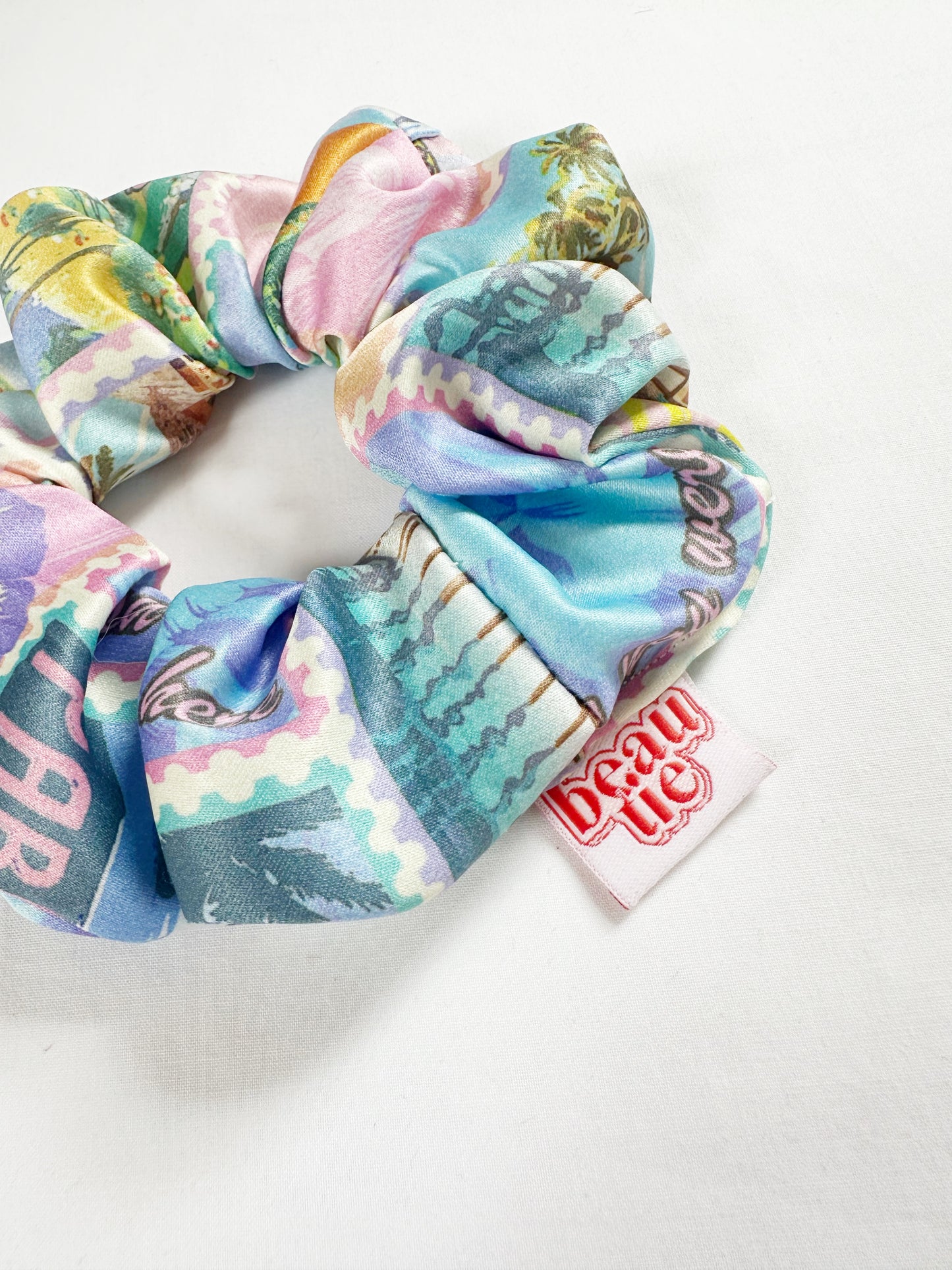 The OG scrunchie in postcard print